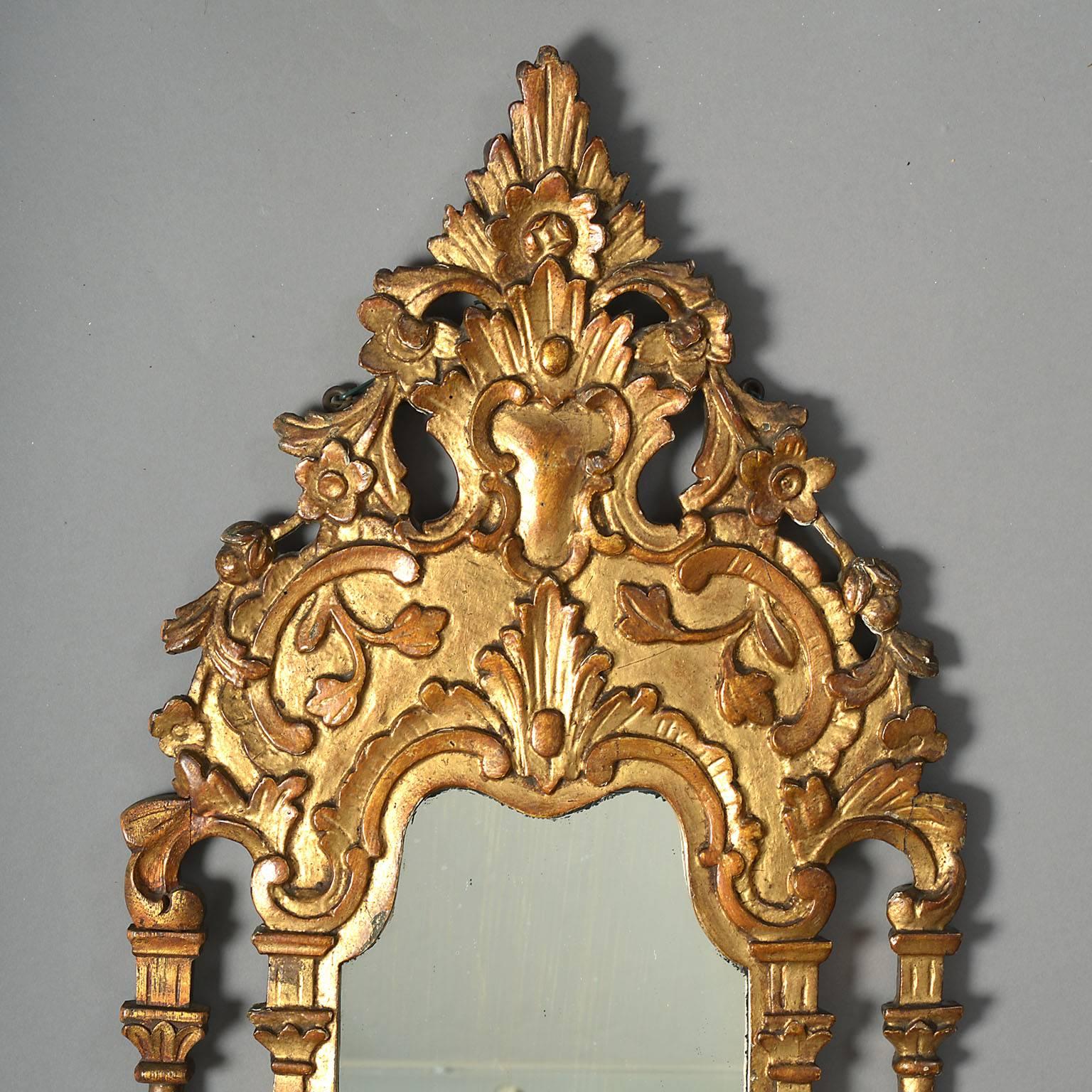 Rare 18th century ottoman giltwood Turban stand
In the form of an arcaded rococo wall-bracket incorporating a shaped mirror plate above a projecting shelf supported on a scrolling bracket.

Ottoman Empire, Turkey, circa late 18th