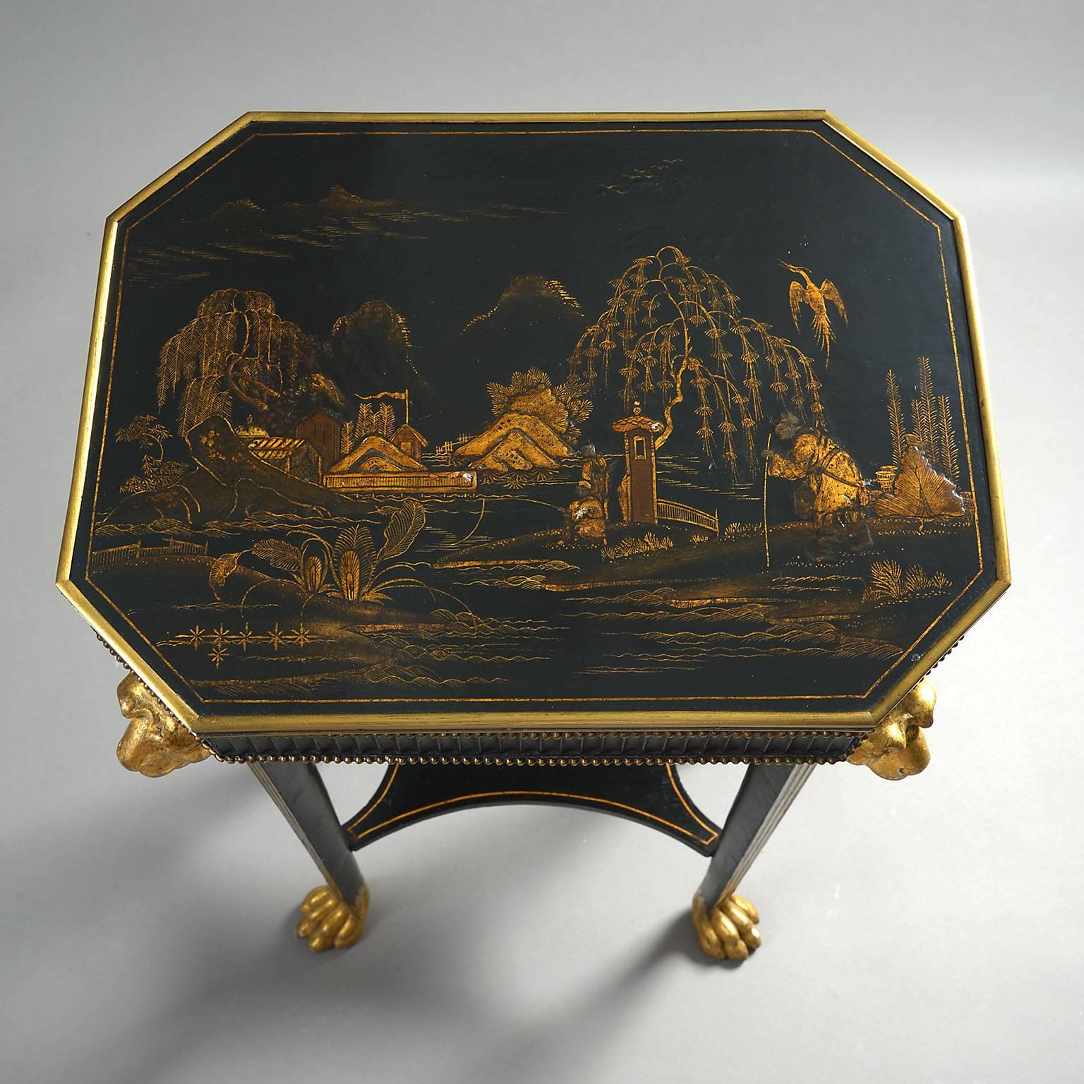 
The canted rectangular top with brass borders and decorated in chinoiserie lacquer depicting figures and birds with pagodas in a mountainous landscape. The fluted frieze with brass beaded mouldings supported on fluted monopod legs with carved