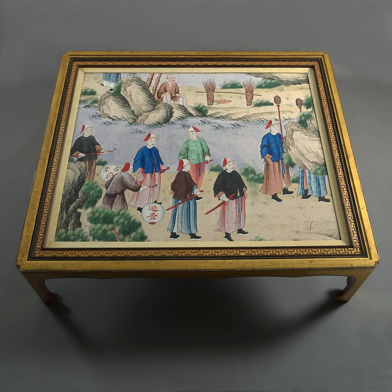 An unusual pair of low tables the tops formed from a pair of late 18th century watercolour and gouache Chinese paintings. One depicting a sedan chair outside a temple with attendants, the other depicting attendants, some armed, in a garden with