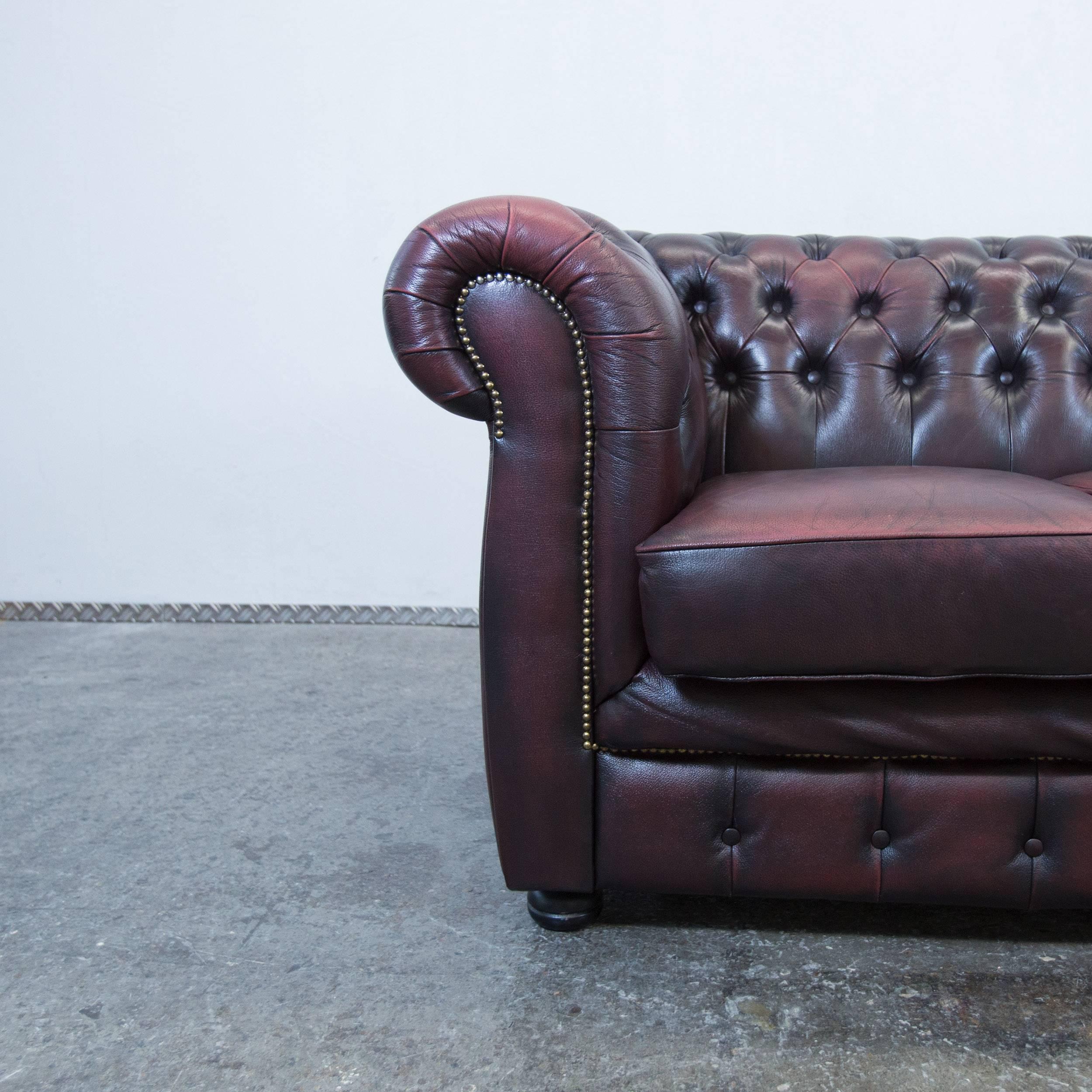 Red leather Chesterfield three-seat sofa by Möbel Art.