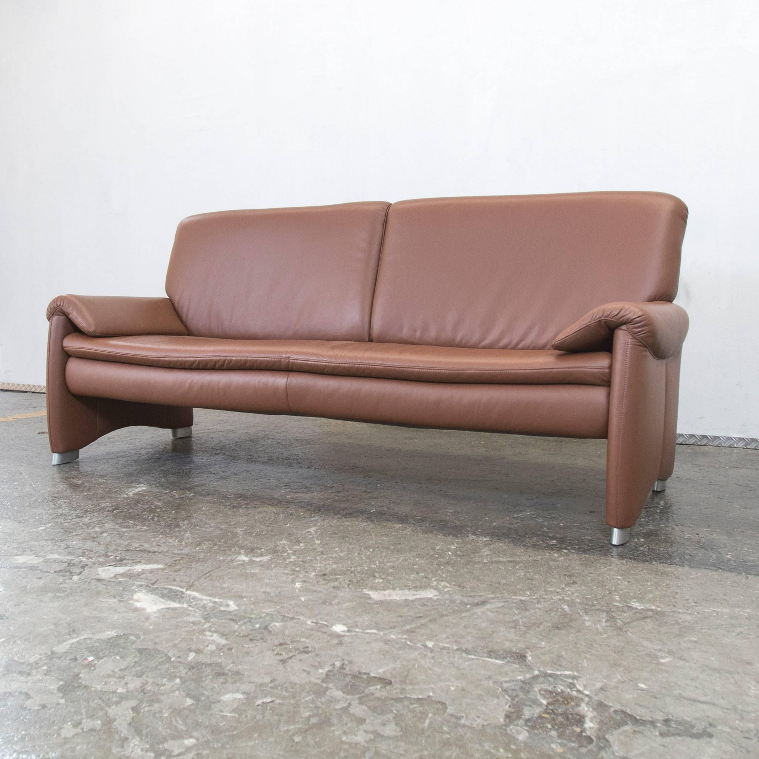 Brown colored Hülsta designer sofa with a modern style, designed for pure comfort.
