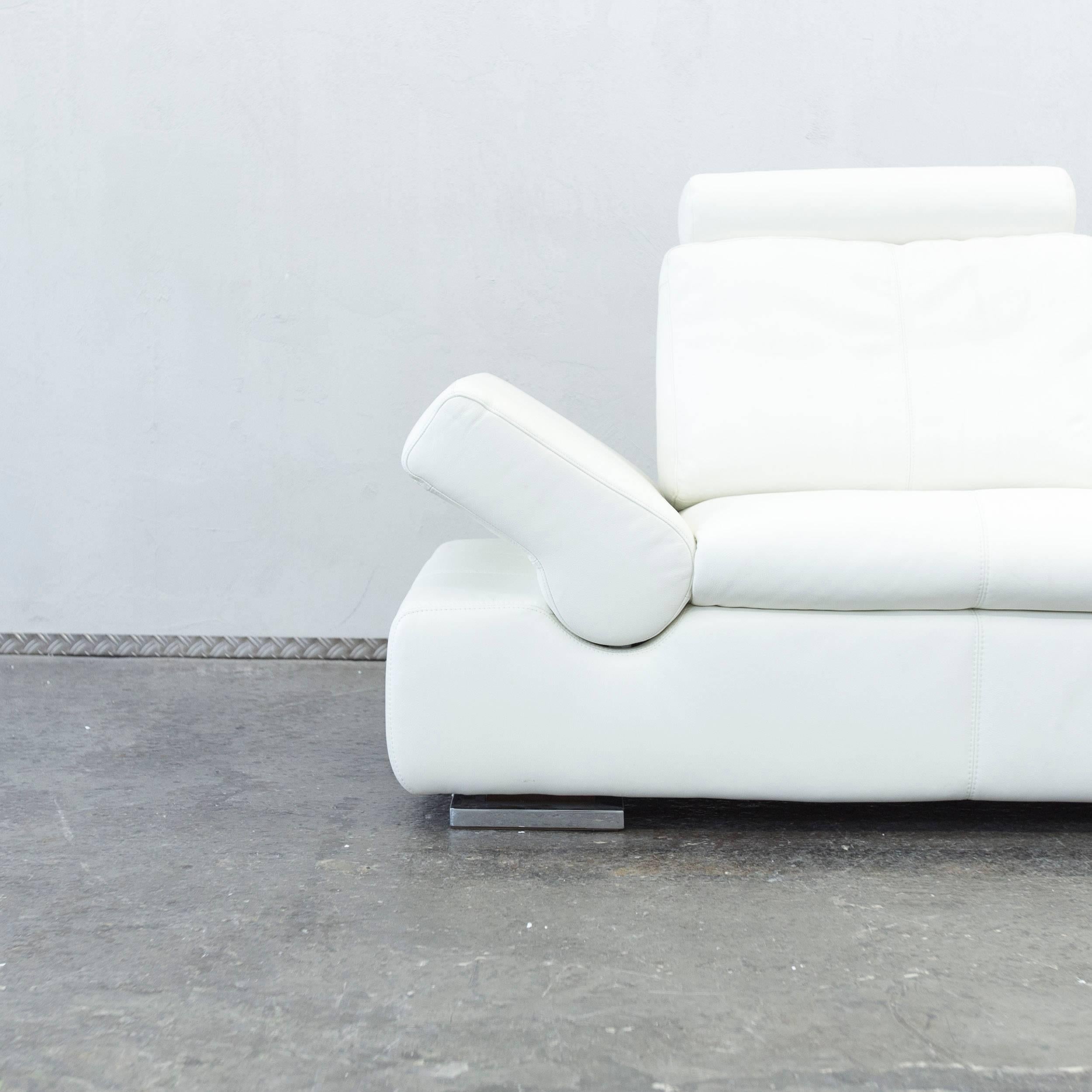 White colored original Musterring Linea designer leather sofa with various convenient functions, designed to provide pure comfort.