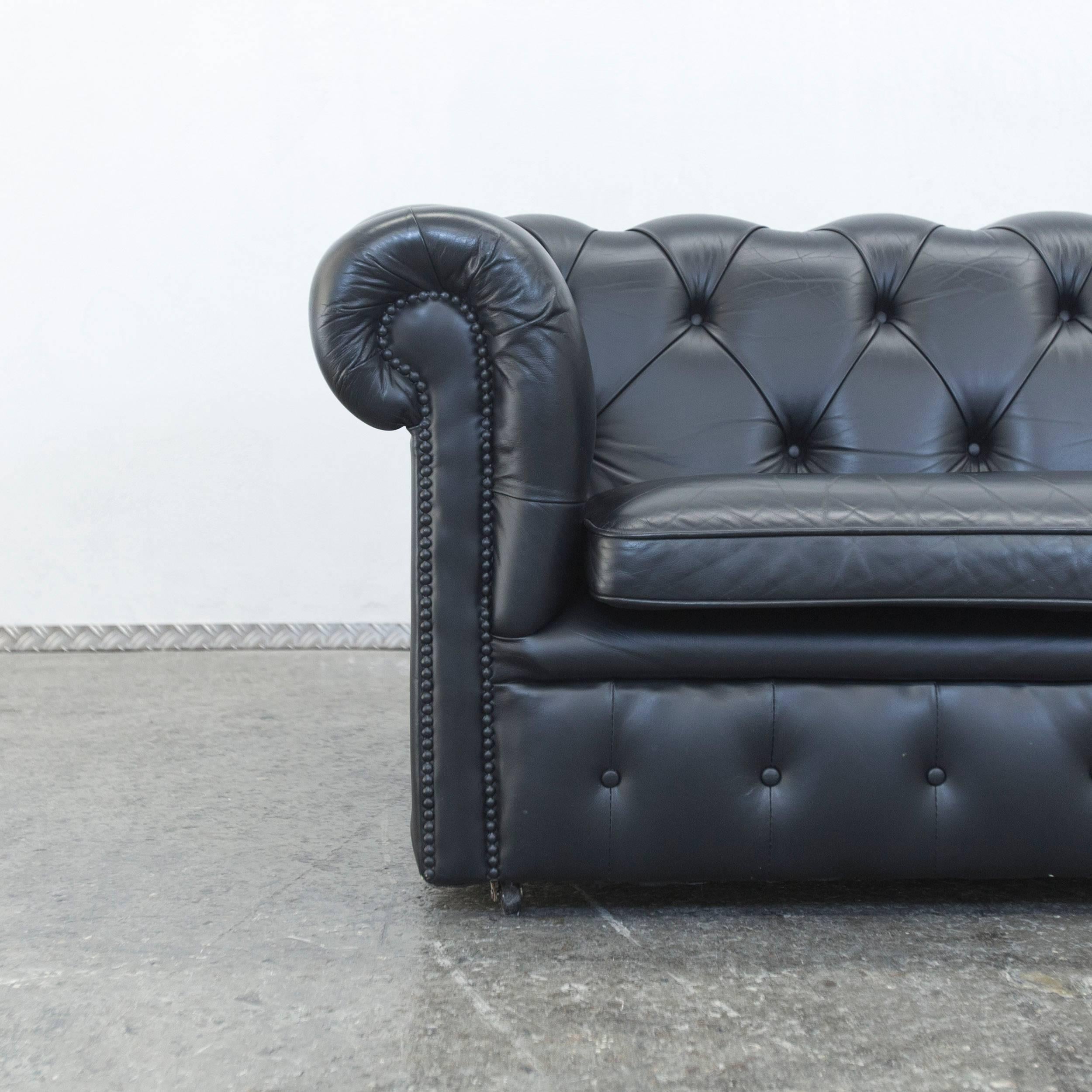 Black colored Springvale Chesterfield leather sofa in a vintage style, designed for pure elegance and comfort.