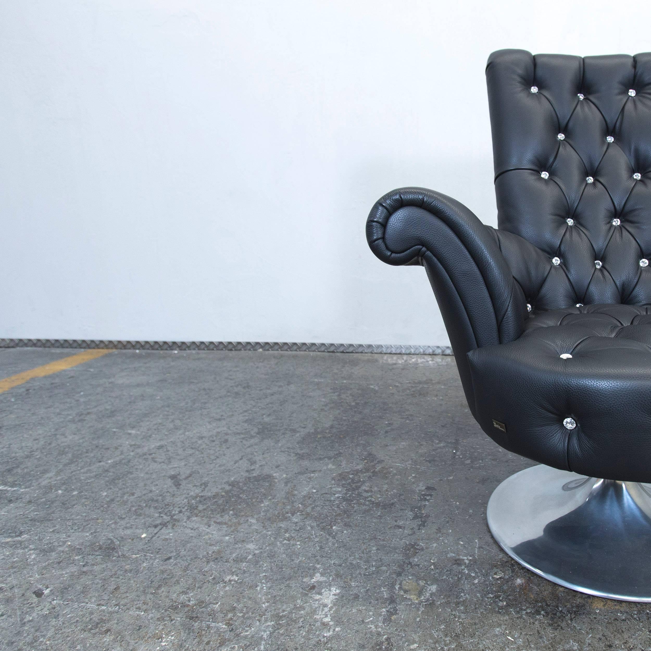 Black colored original Bretz Pompadour designer leather swivel chair in an elegant design, with original Swarovski crystals.
