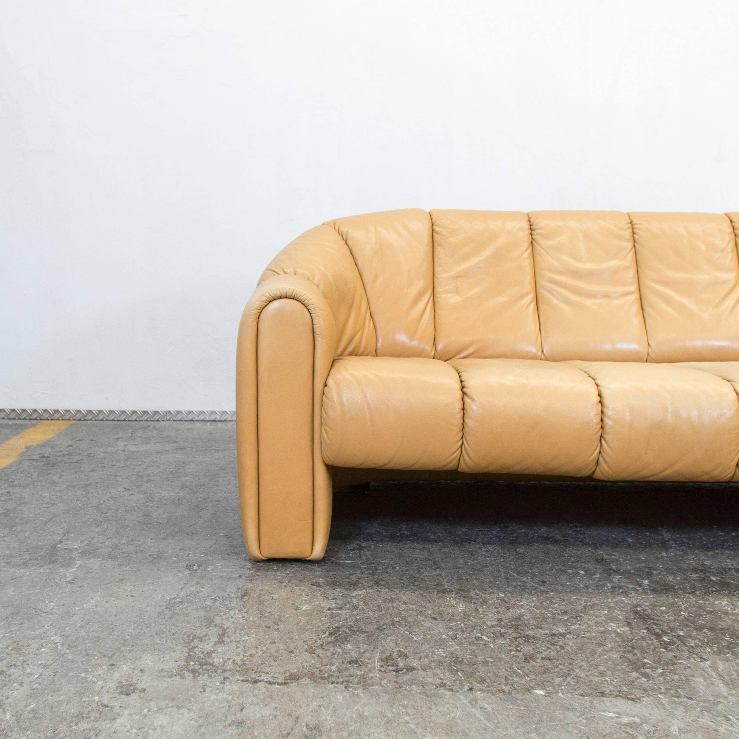 Brown colored original COR designer leather sofa in a vintage style, designed for pure comfort.