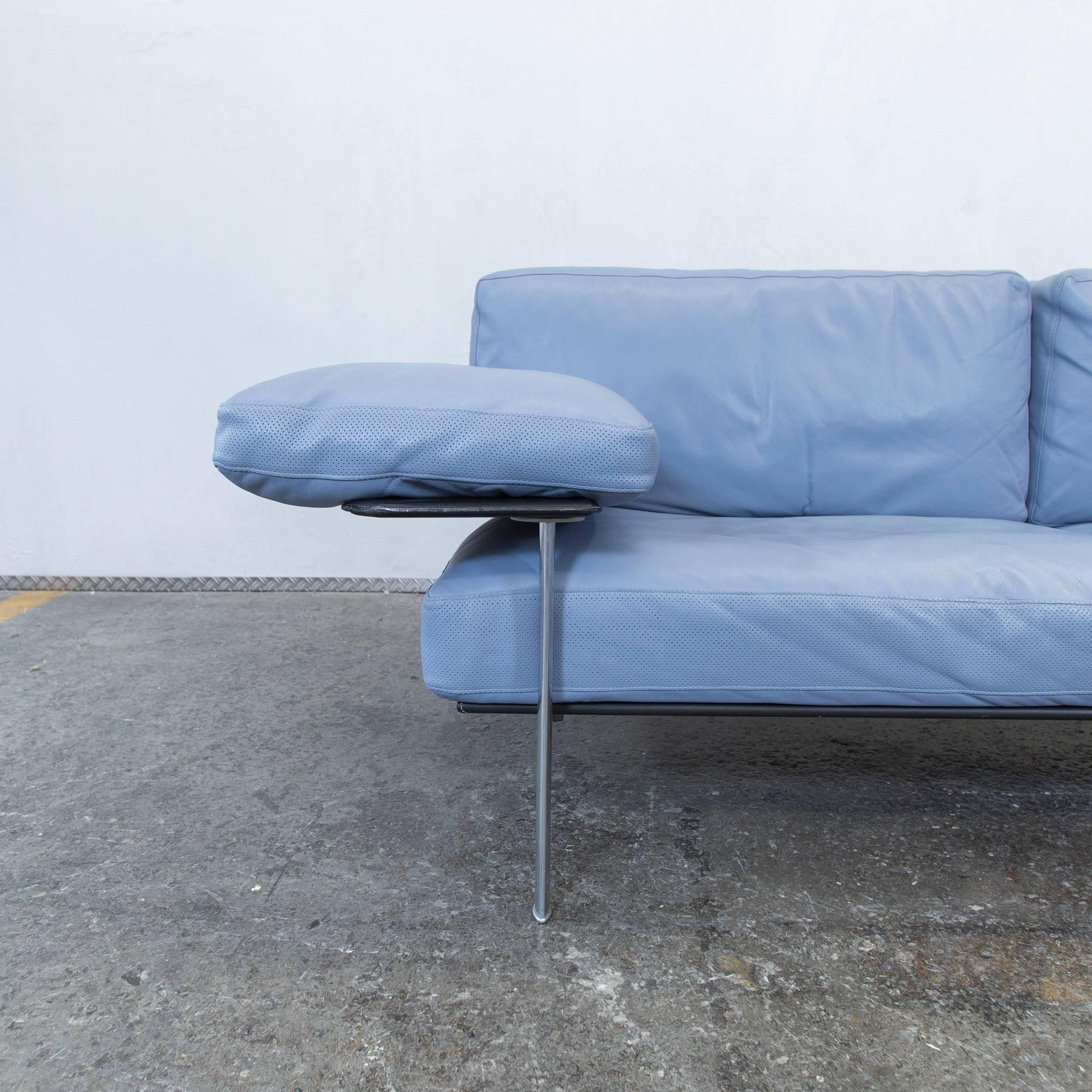 Blue colored original B&B Italia designer sofa in a minimalistic and modern design, made for pure comfort.