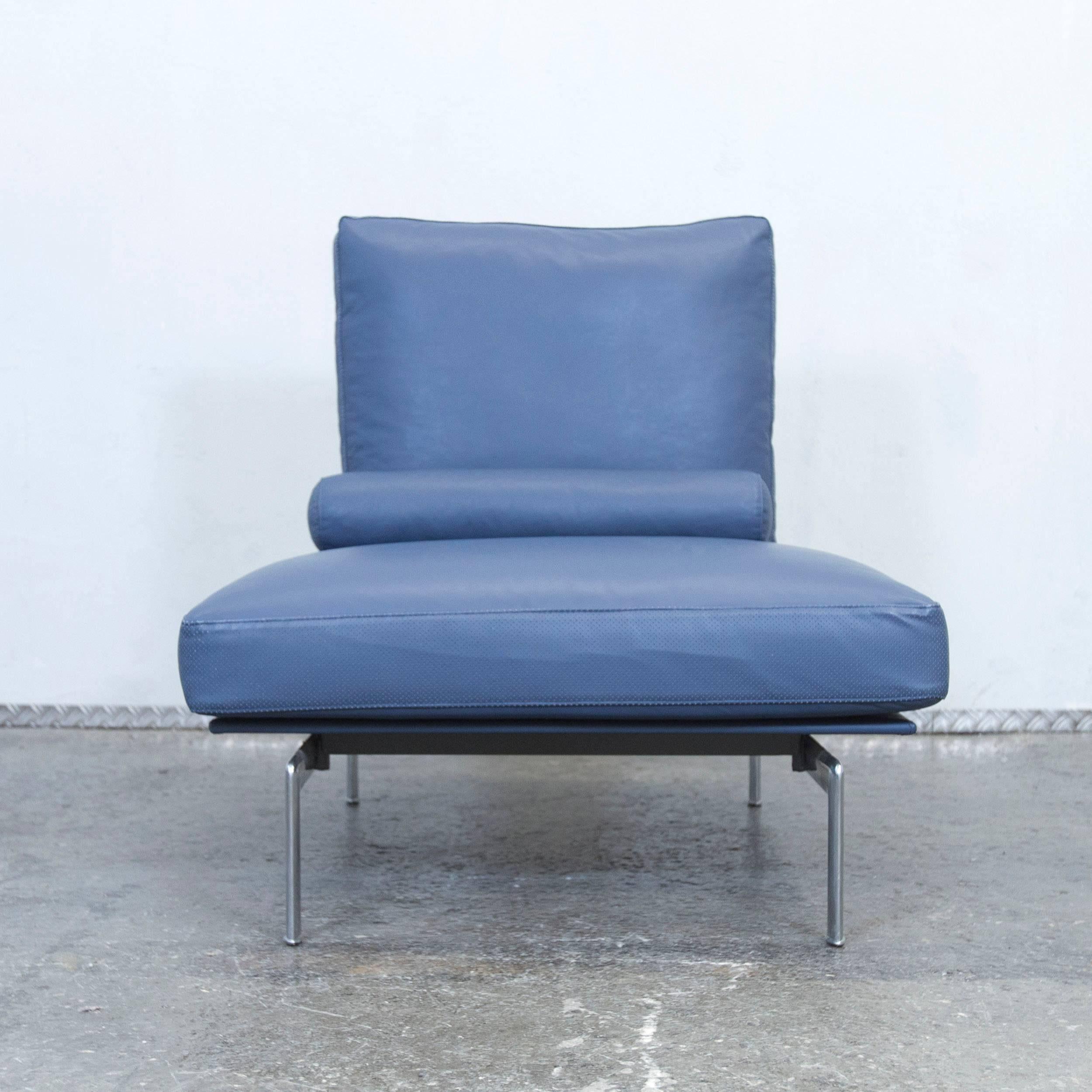 Blue colored original B&B Italia Diesis designer leather chair in a minimalistic and modern design, made for pure comfort.