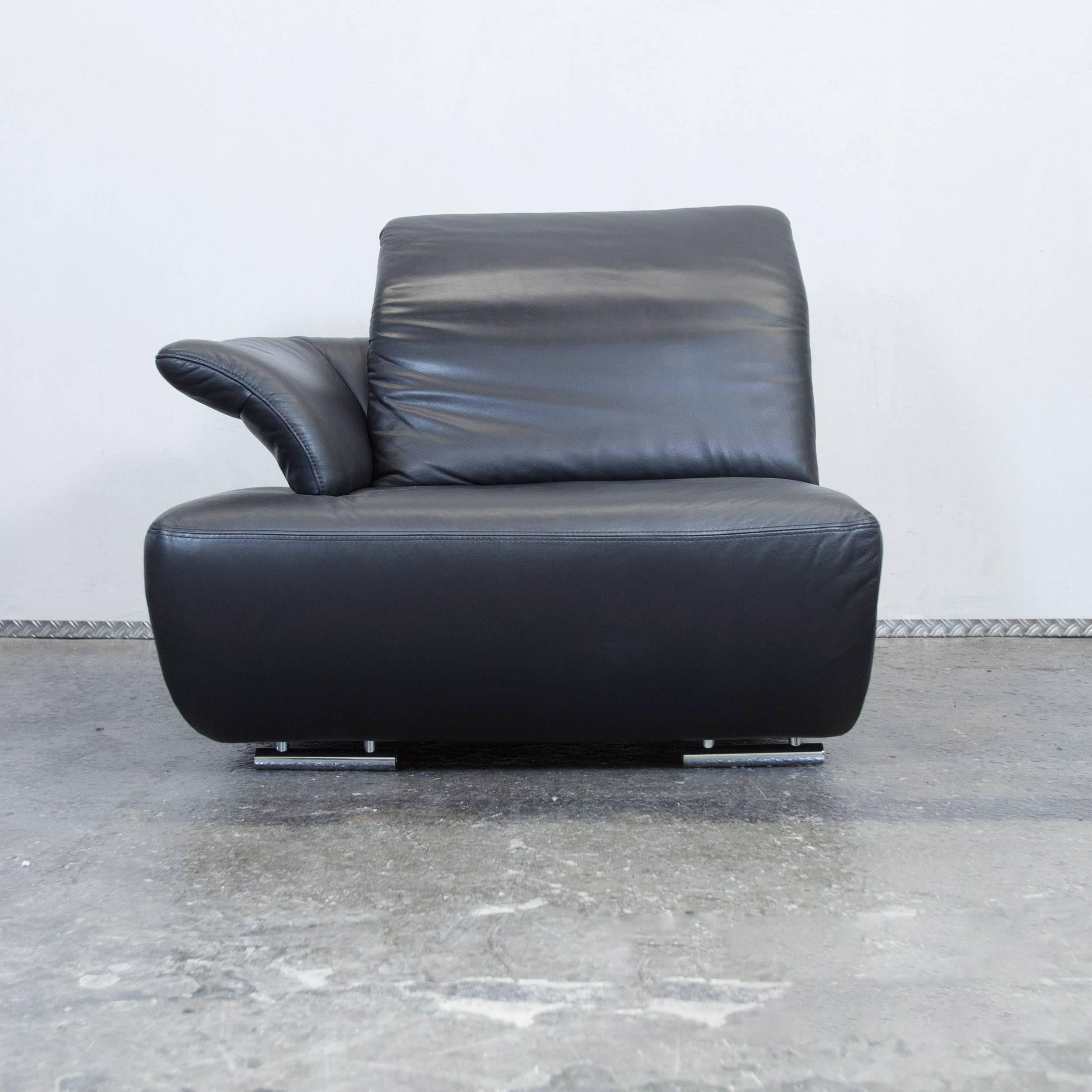 Black colored original Koinor Avanti designer leather chair in a minimalistic and modern design.