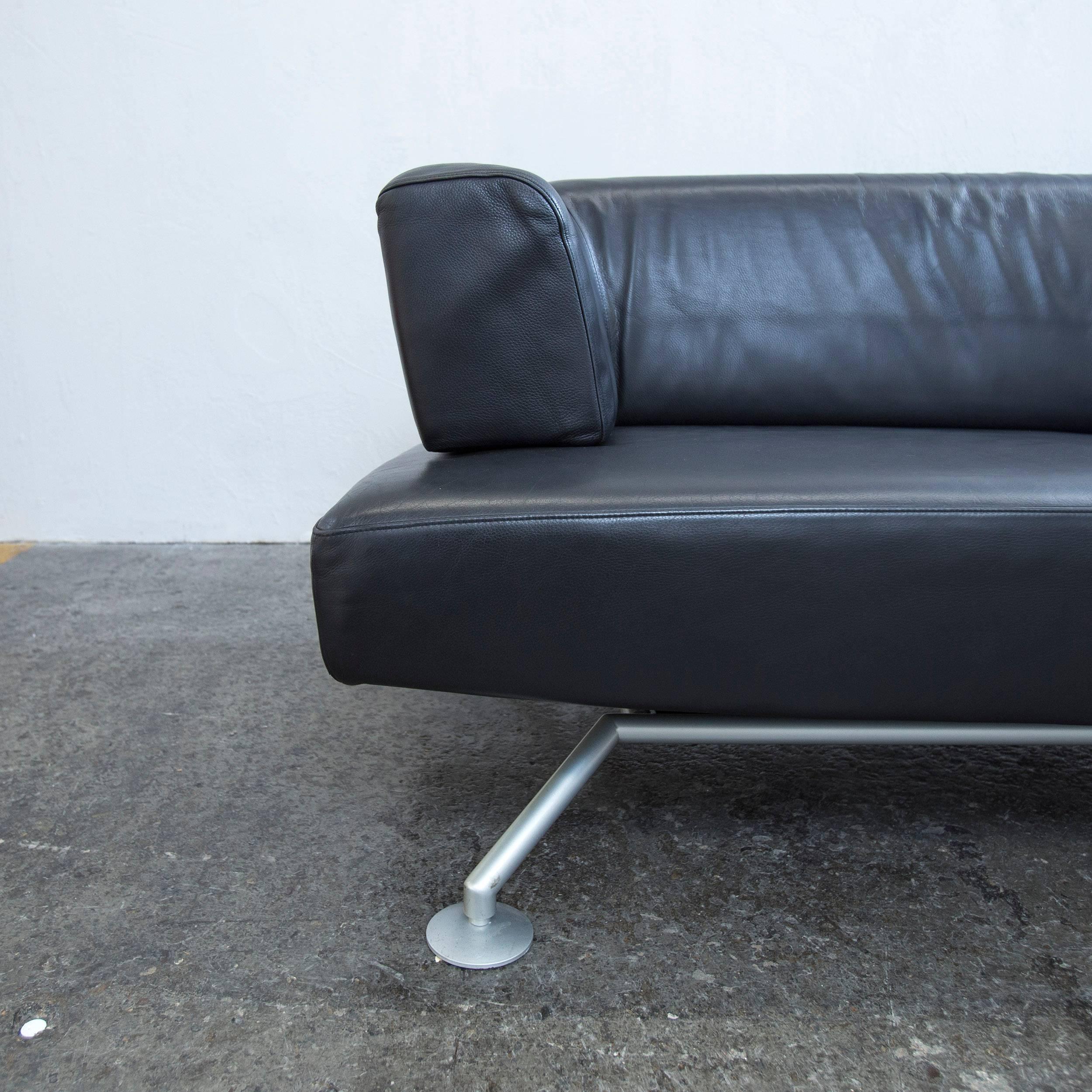 Black colored original COR Circum designer leather sofa in a minimalistic and modern design, made for pure comfort and flexibility.