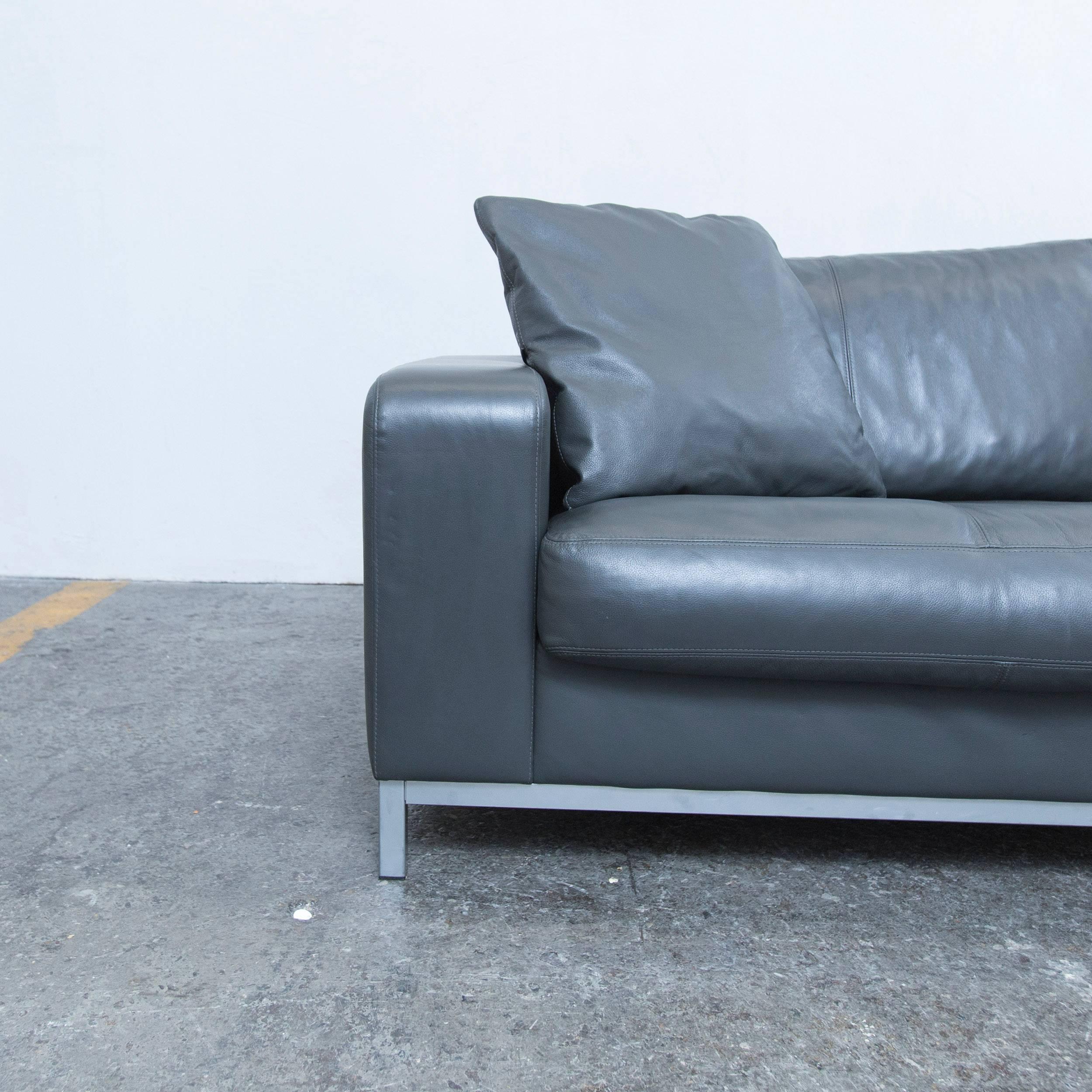 Grey colored original Machalke designer leather sofa in a modern and minimalistic design, made for pure comfort.