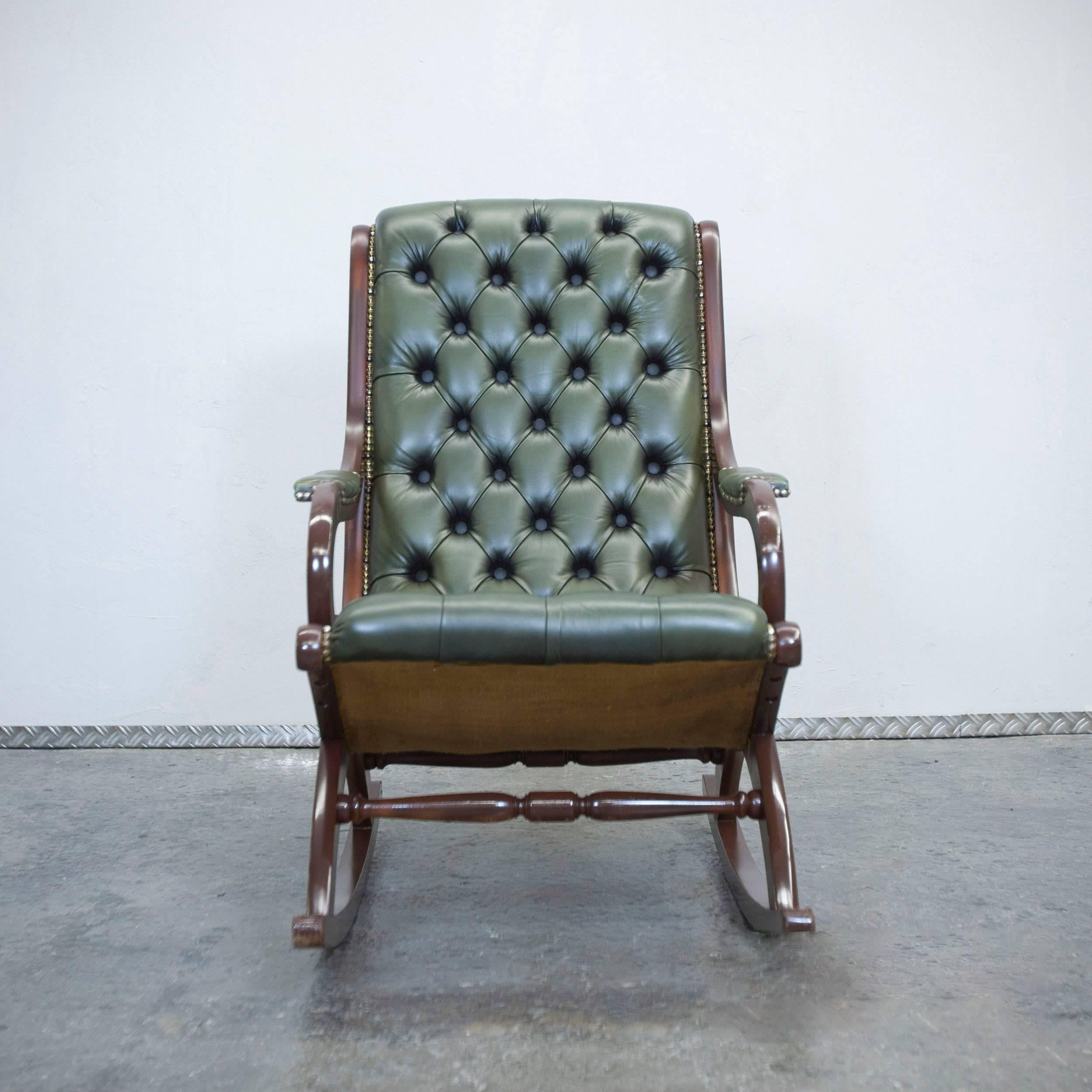 Green colored Chesterfield leather rockingchair in a vintage design, made for pure comfort.