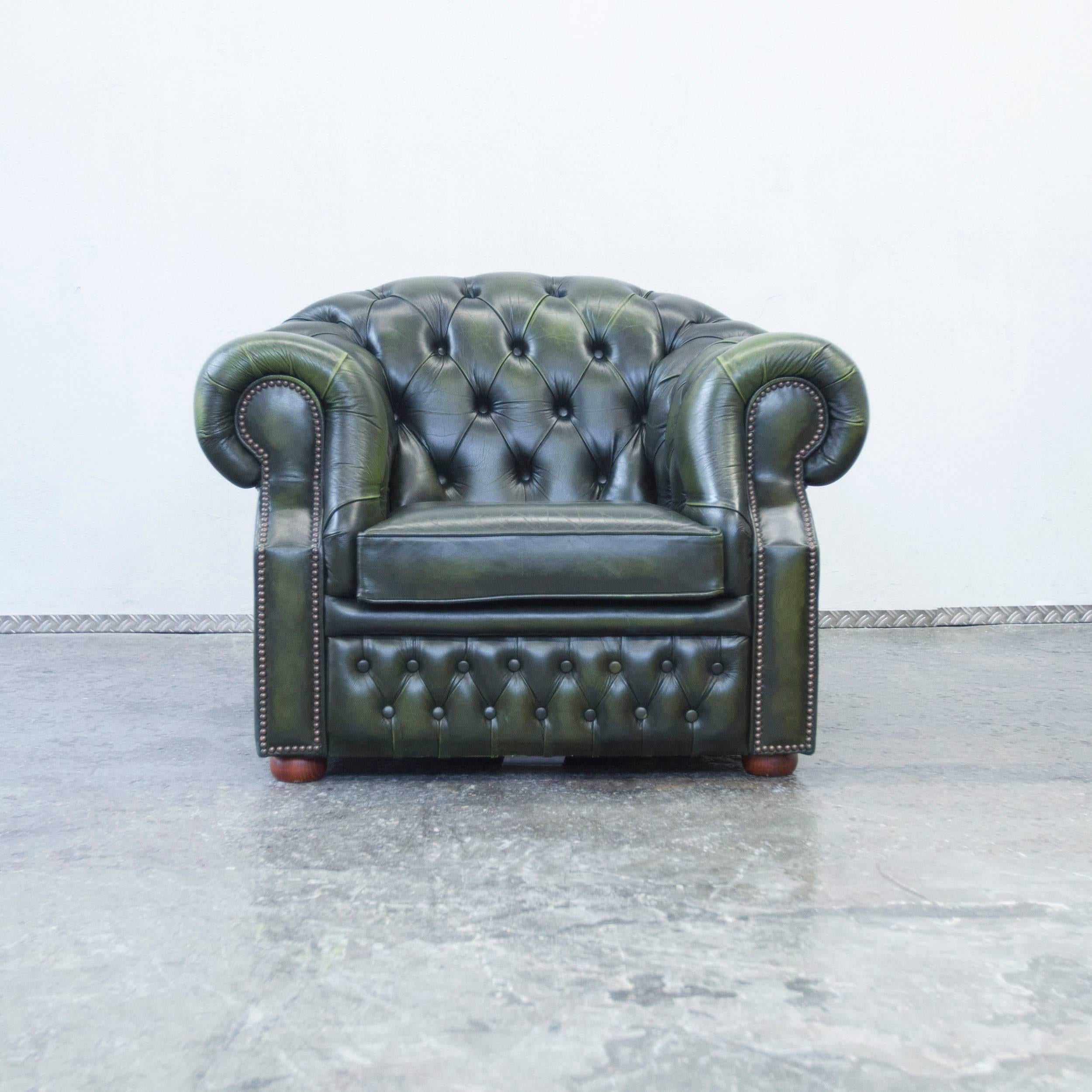 Green colored original Centurion Chesterfield leather armchair in a vintage design, made for pure comfort and elegance.