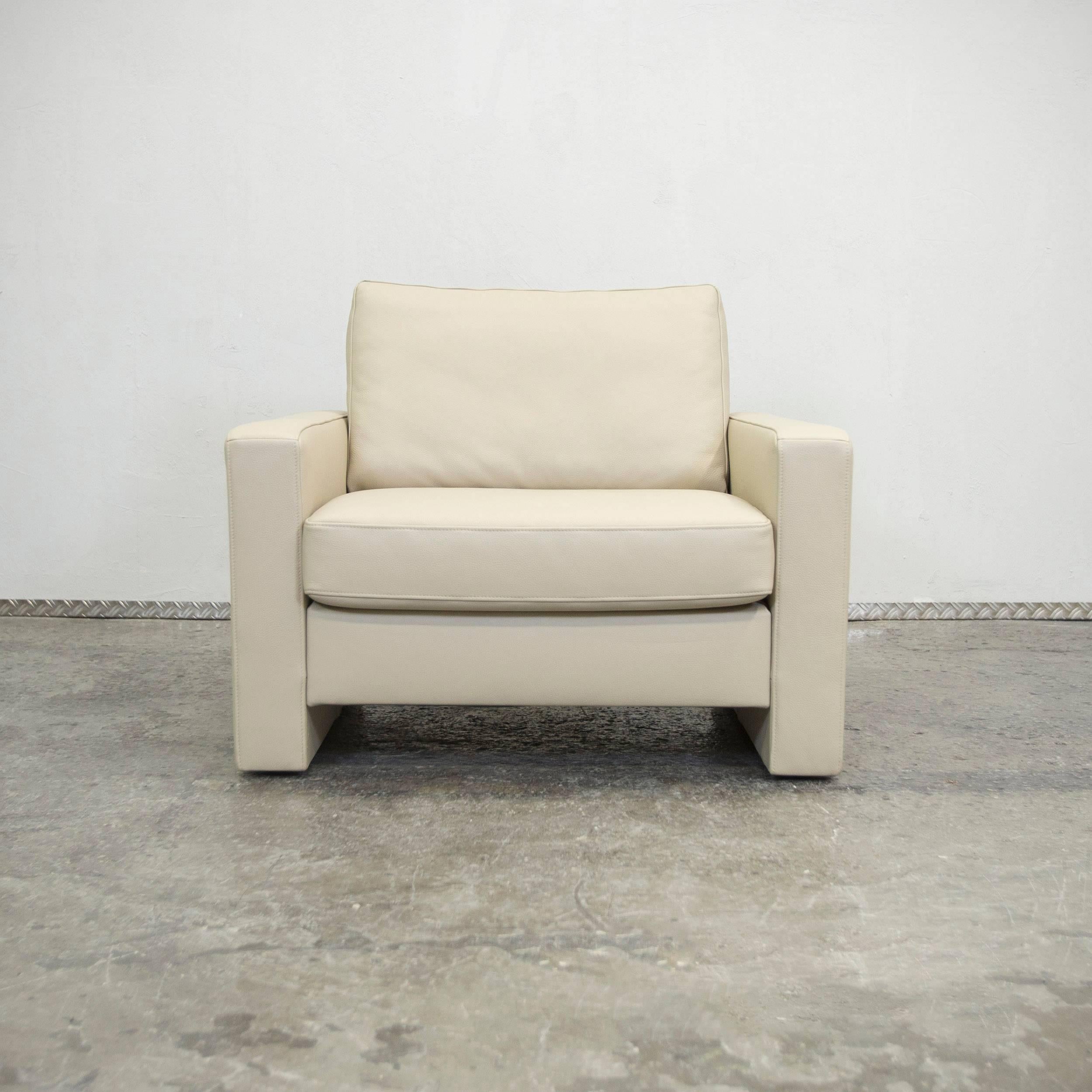 Beige colored original Ewald Schillig designer leather armchair in a minimalistic and modern design, made for pure comfort.