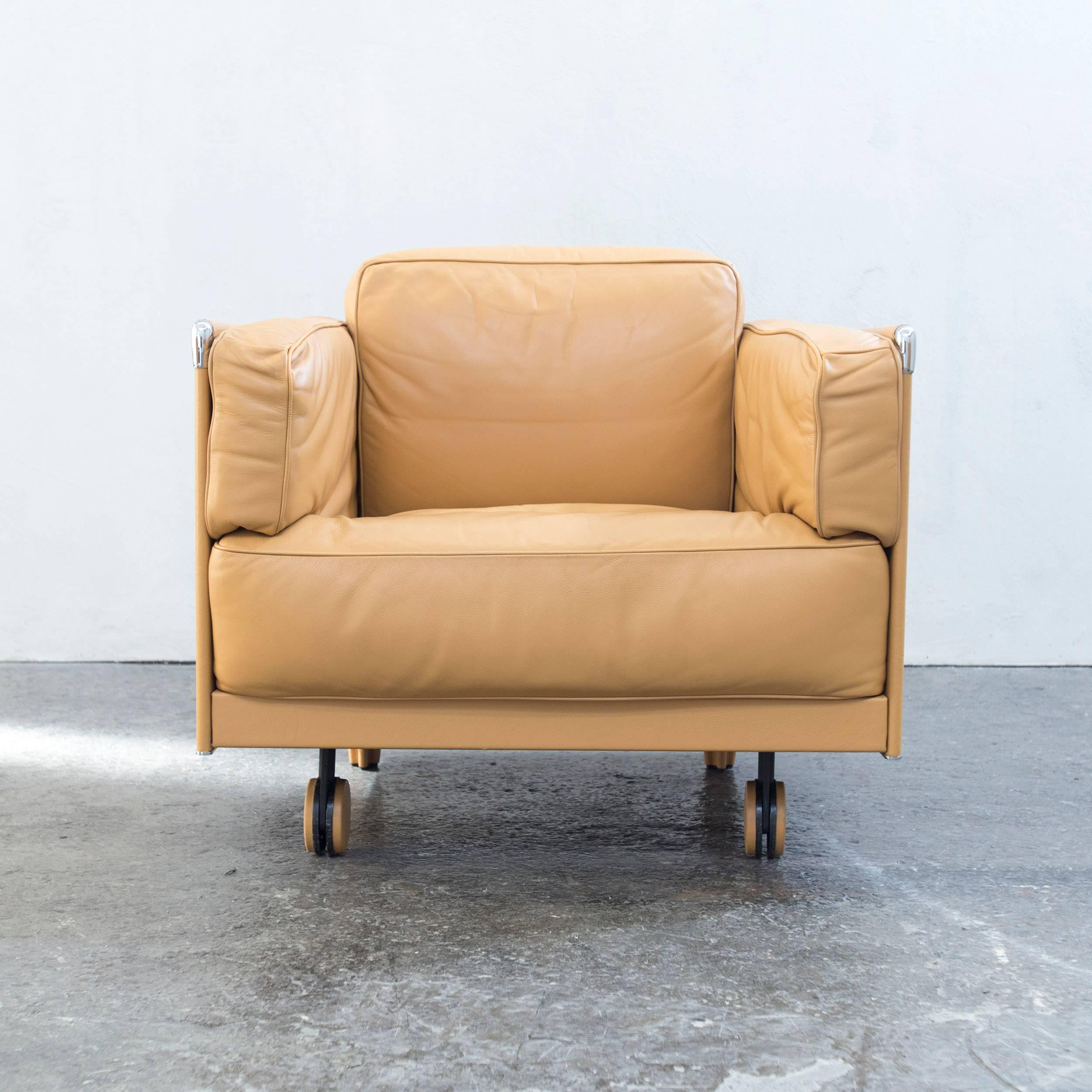 Mustard yellow colored original Poltrona Frau twice 1999 designer leather chair in a minimalistic and modern design, made for pure comfort.