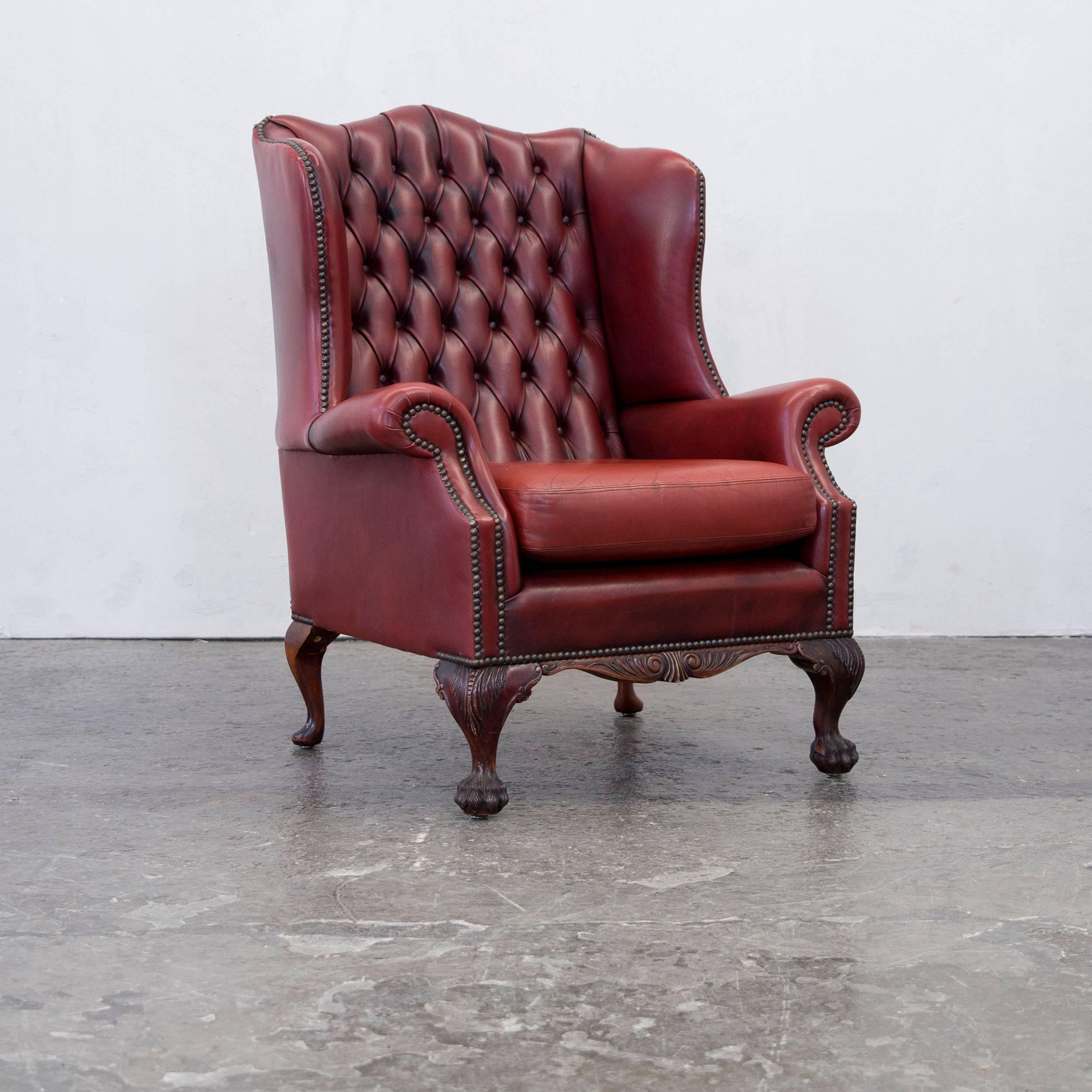 Oxblood red colored set of four Chesterfield wingback chairs leather stunning color and true vintage pieces.