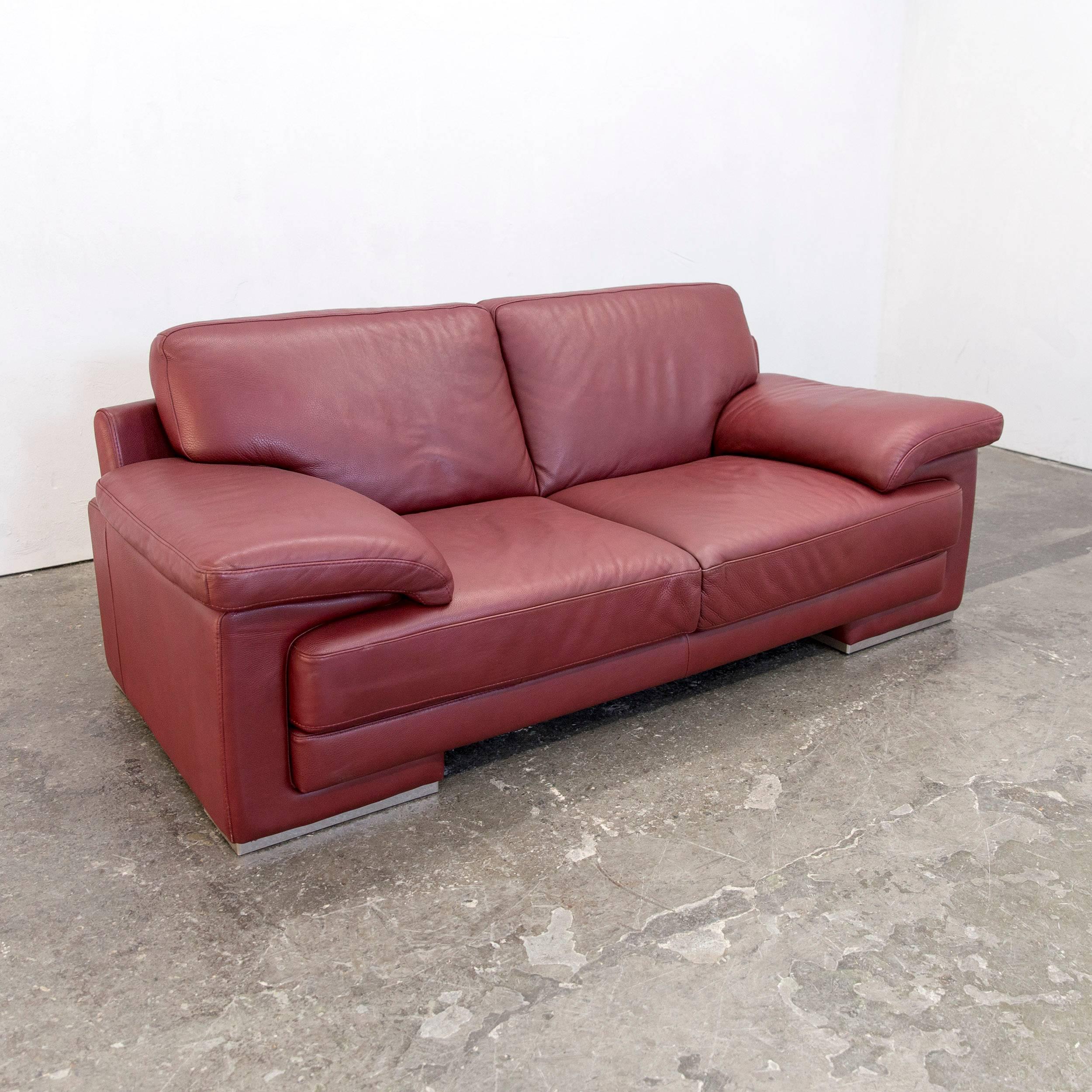 red natuzzi leather sofa