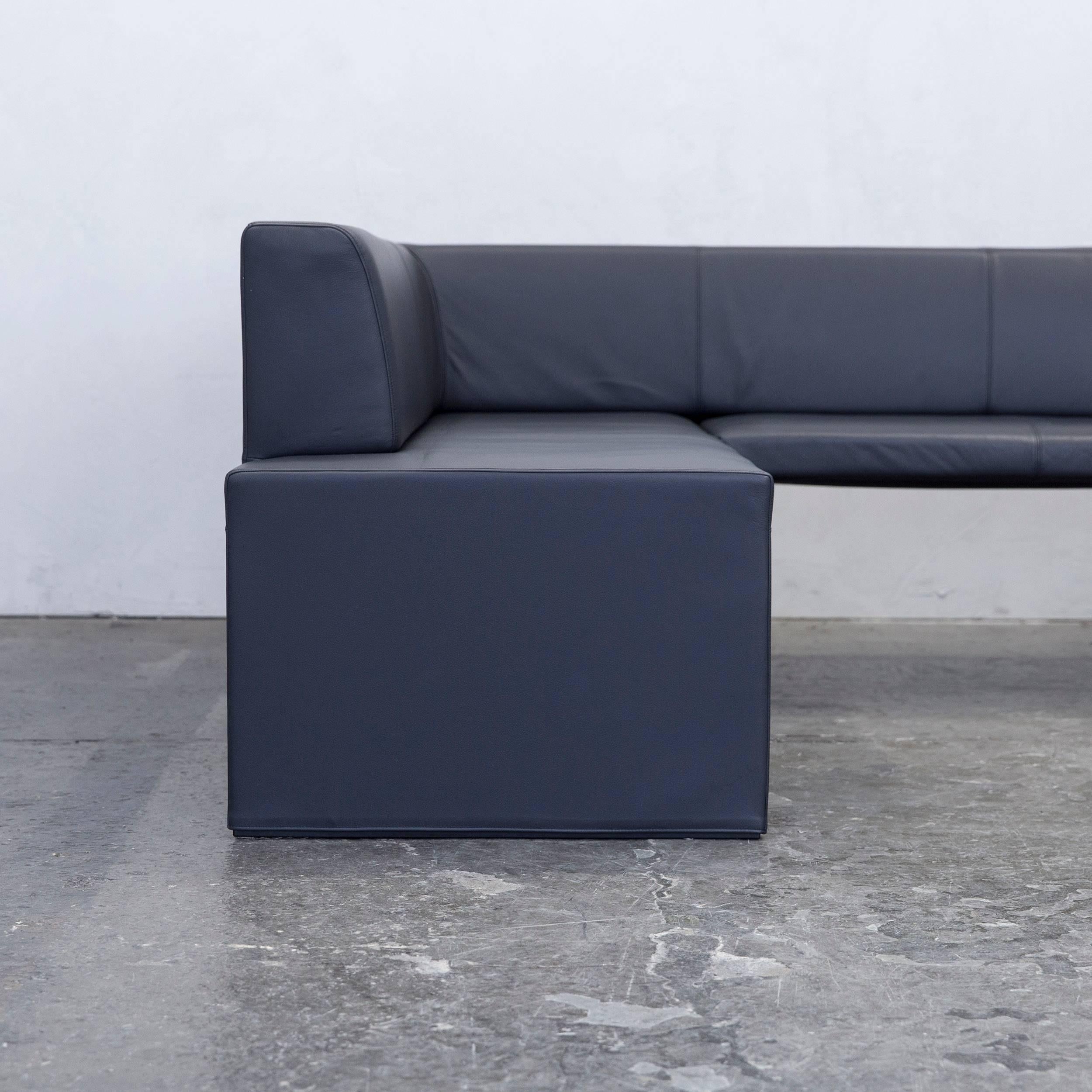 Anthrazit grey colored original Walter Knoll Together designer leather corner sofa in a minimalistic and modern design.