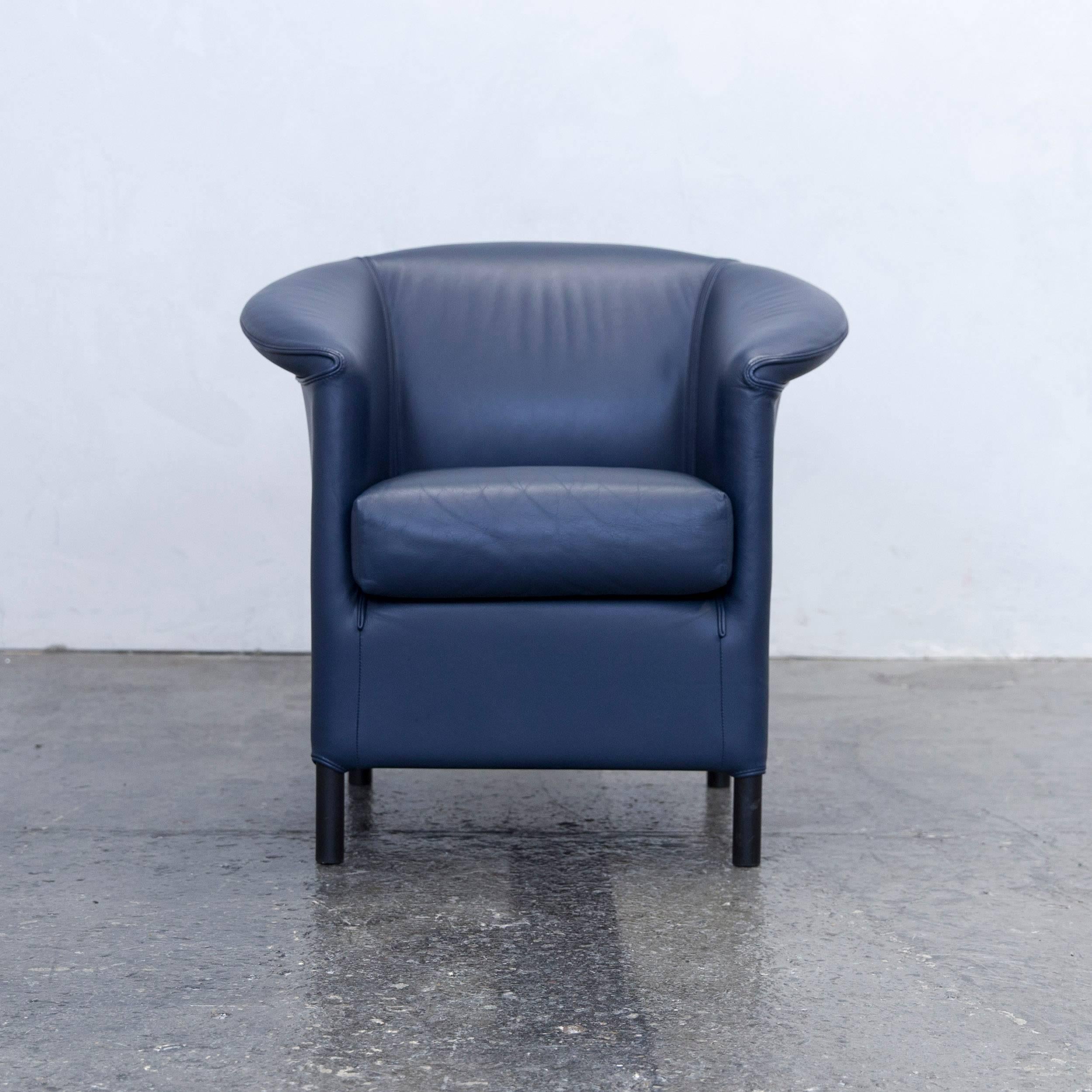 Blue colored original Wittmann Aura designer leather armchair, in a minimalistic and modern design, made for pure comfort.