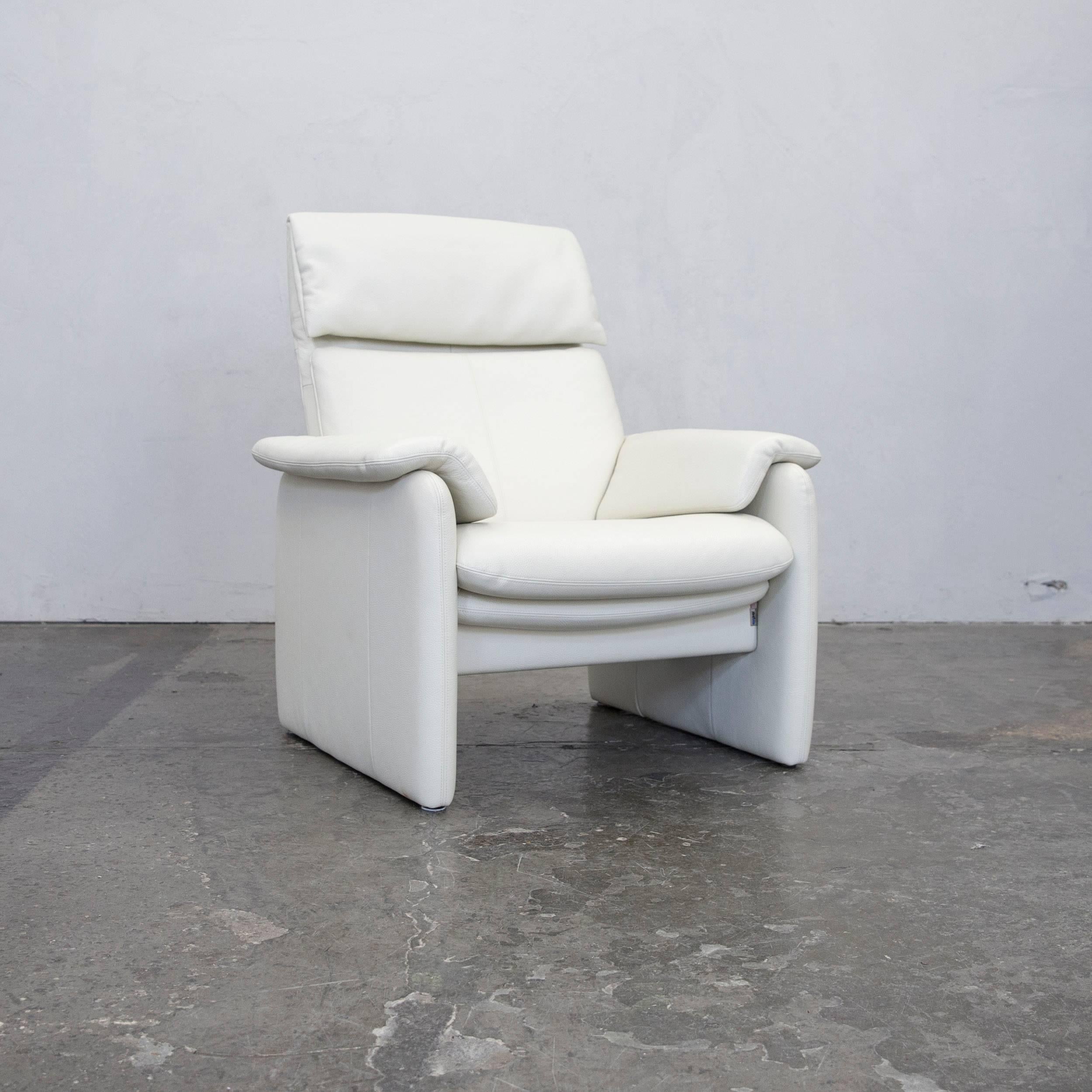 Crème white colored original Erpo Lugano designer leather armchair in a minimalistic and modern design, with convenient functions, made for pure comfort and flexibility.