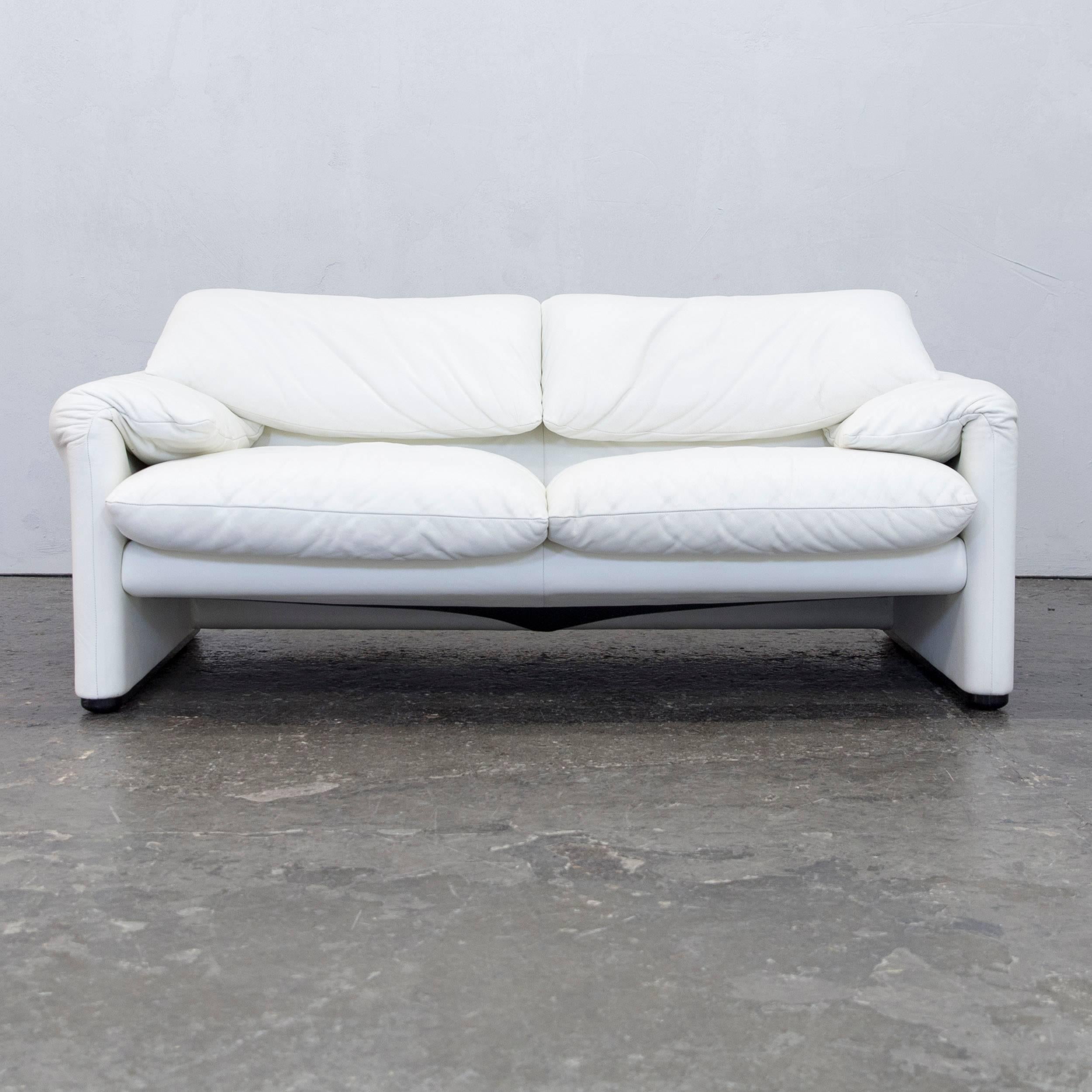 White colored original Cassina Maralunga designer leather sofa in a minimalistic and modern design, with convenient functions, made for pure comfort and flexibility.