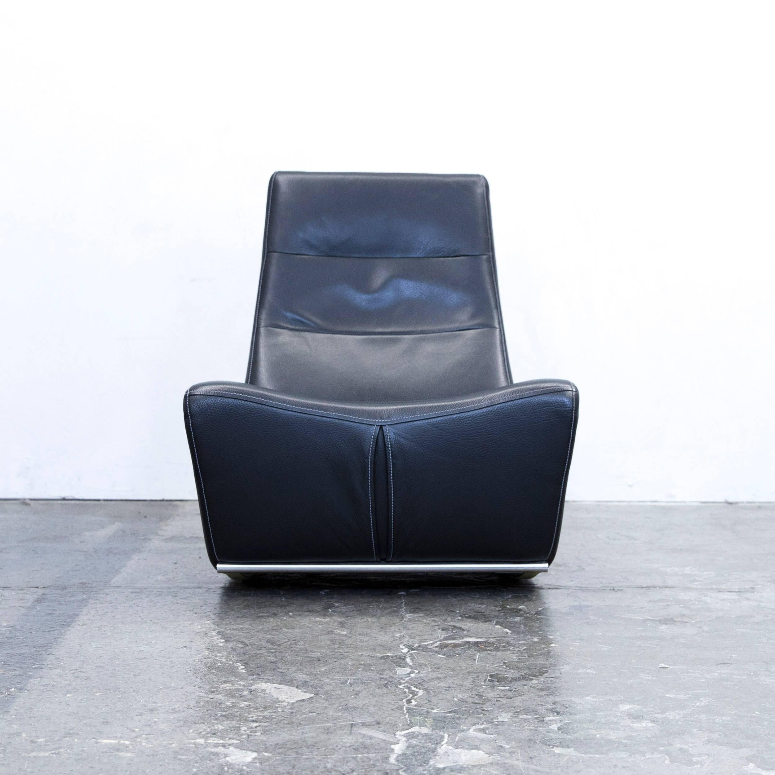 Black colored original Himolla Maximilian designer leather chair in a minimalistic and modern design, made for pure comfort.