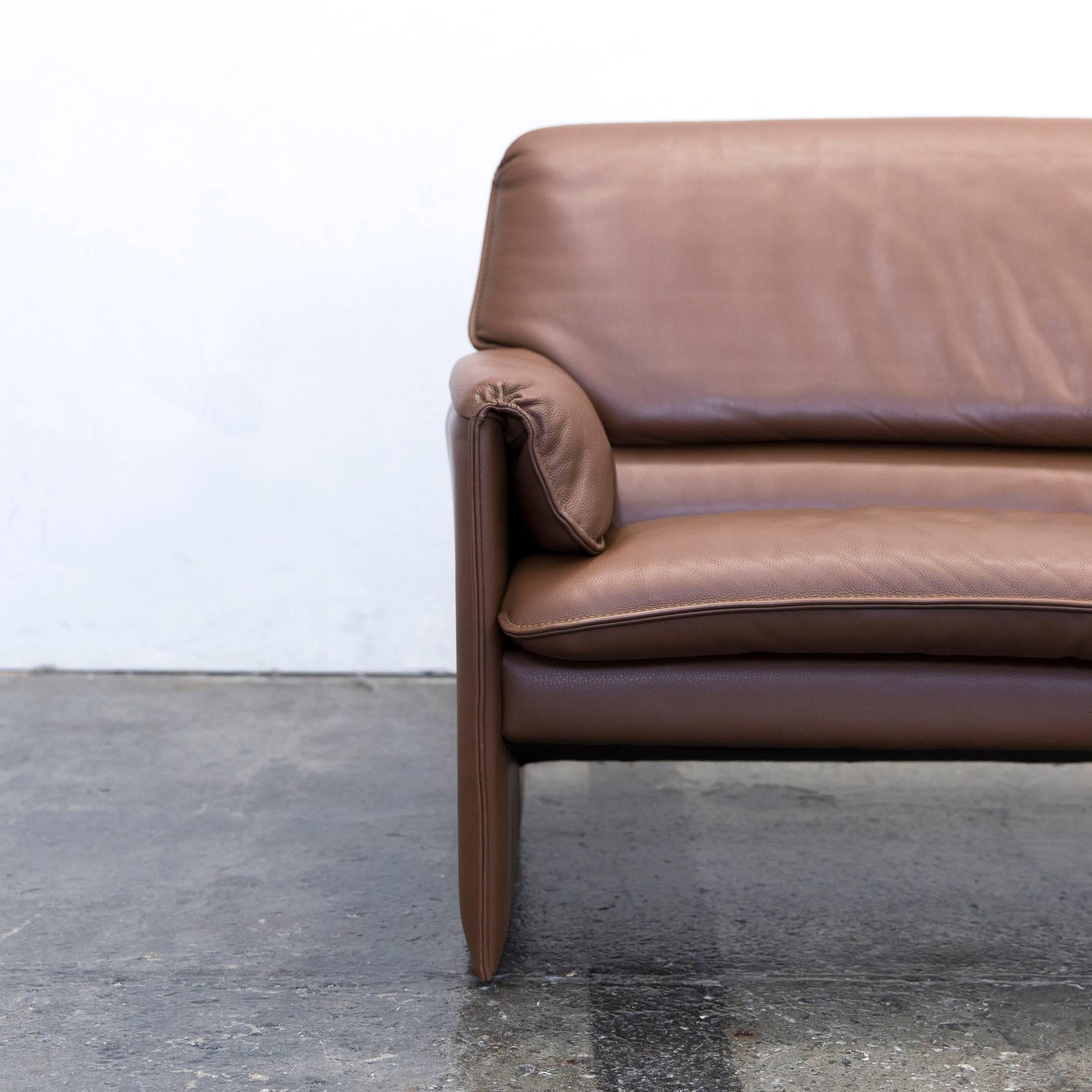 Brown colored original Leolux Bora designer leather sofa in a minimalistic and modern design, made for pure comfort.