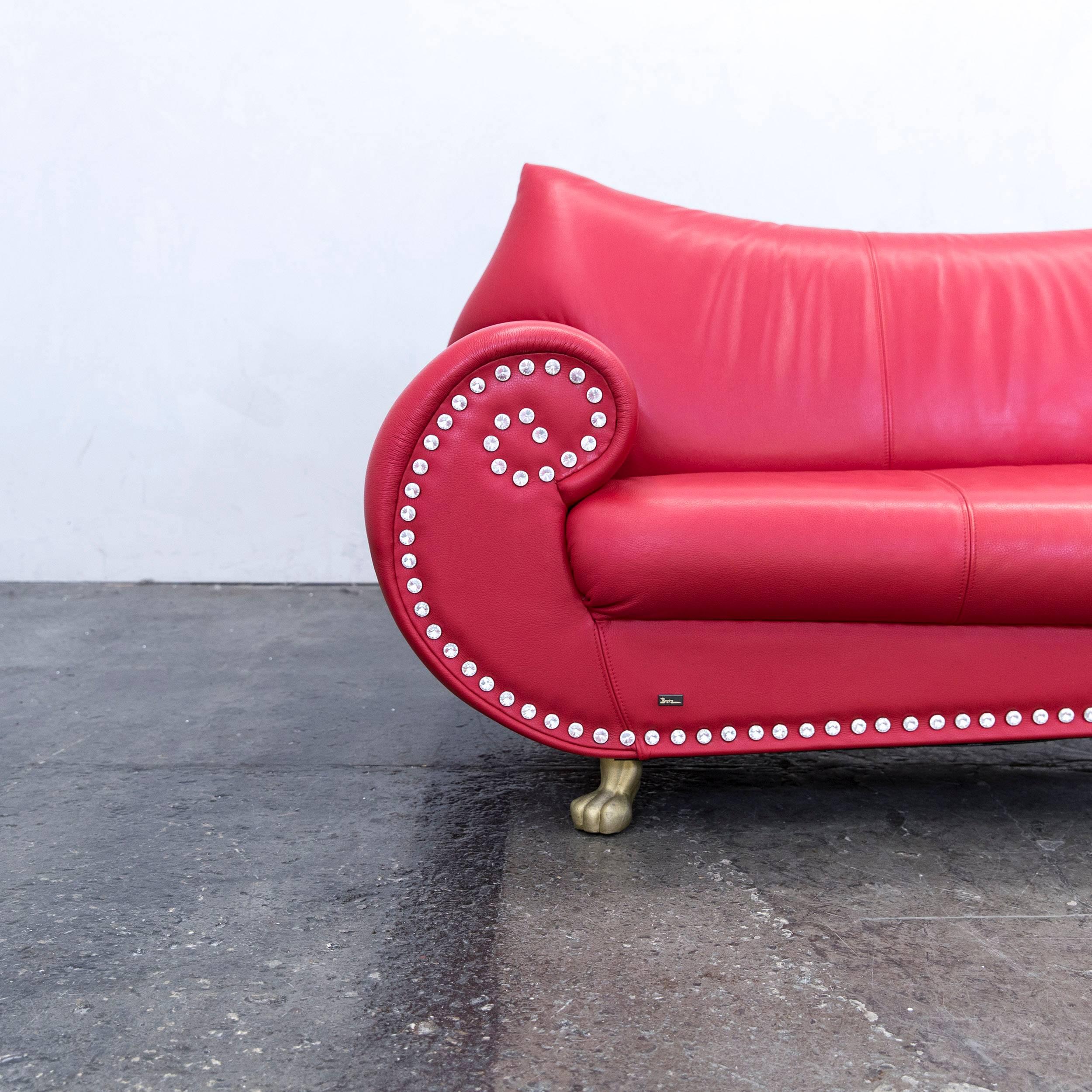 Red colored original Bretz Gaudi designer leather sofa in a minimalistic and modern design, with original Swarovski crystals, made for pure elegance and style.