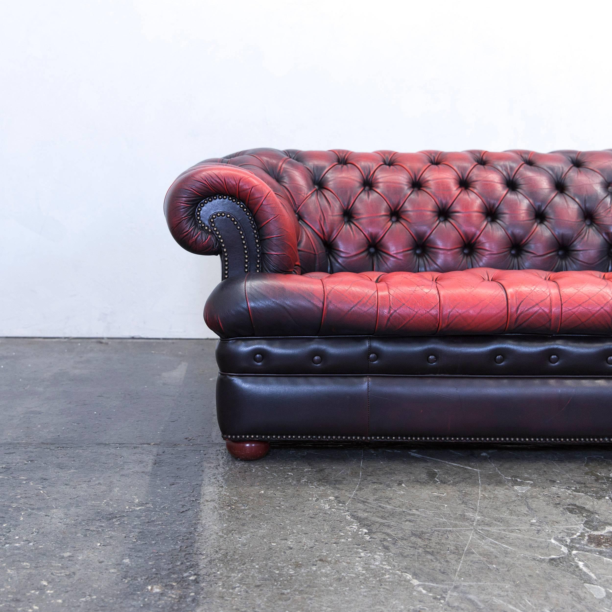 Red brown colored Chesterfield leather sofa in a vintage design, made for pure comfort and elegance.