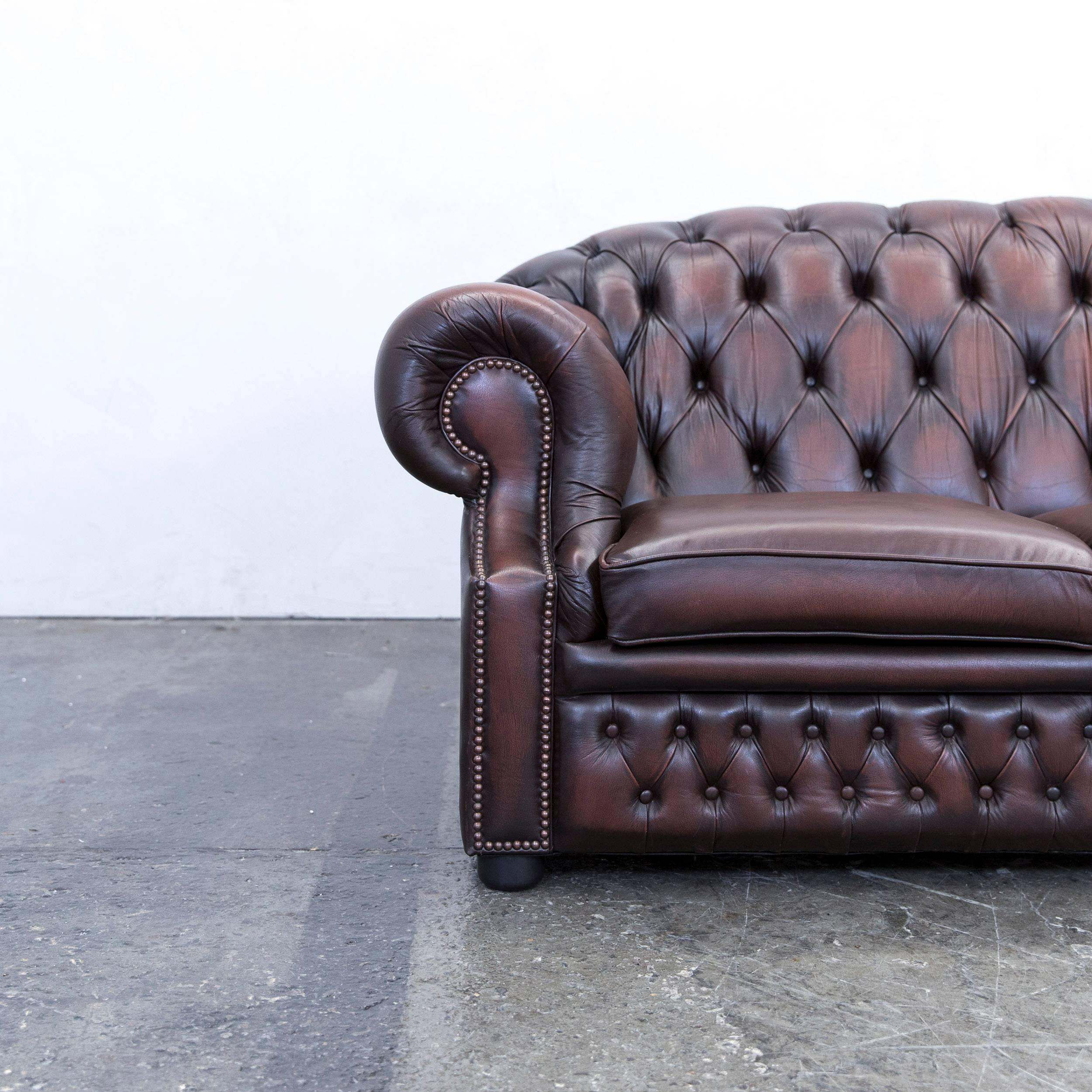 Brown colored original Centurion Chesterfield leather sofa in a vintage design, made for pure comfort and elegance.