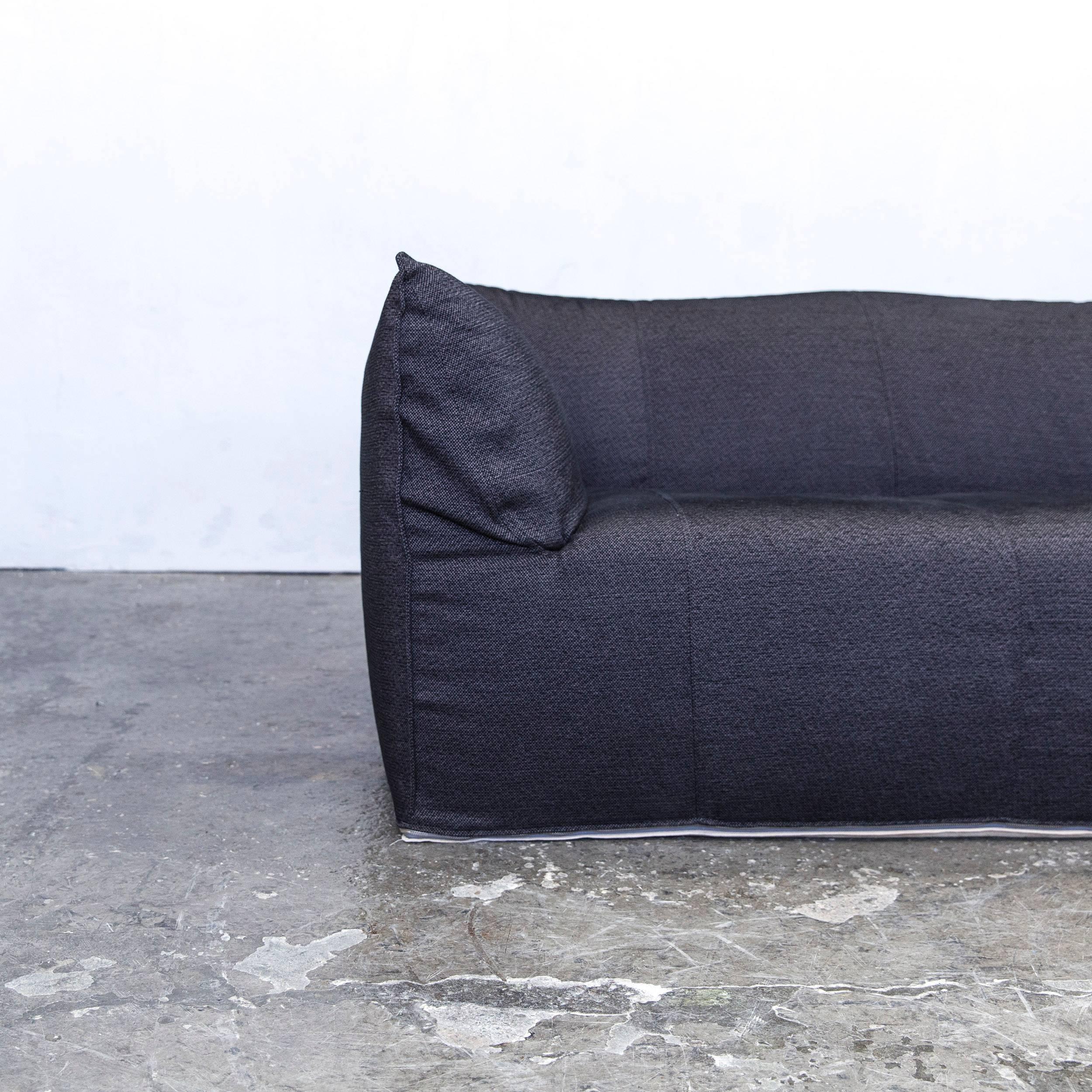 Dark grey colored original B&B Italia Le Bambole designer sofa in a minimalistic and modern design, made for pure comfort and style.