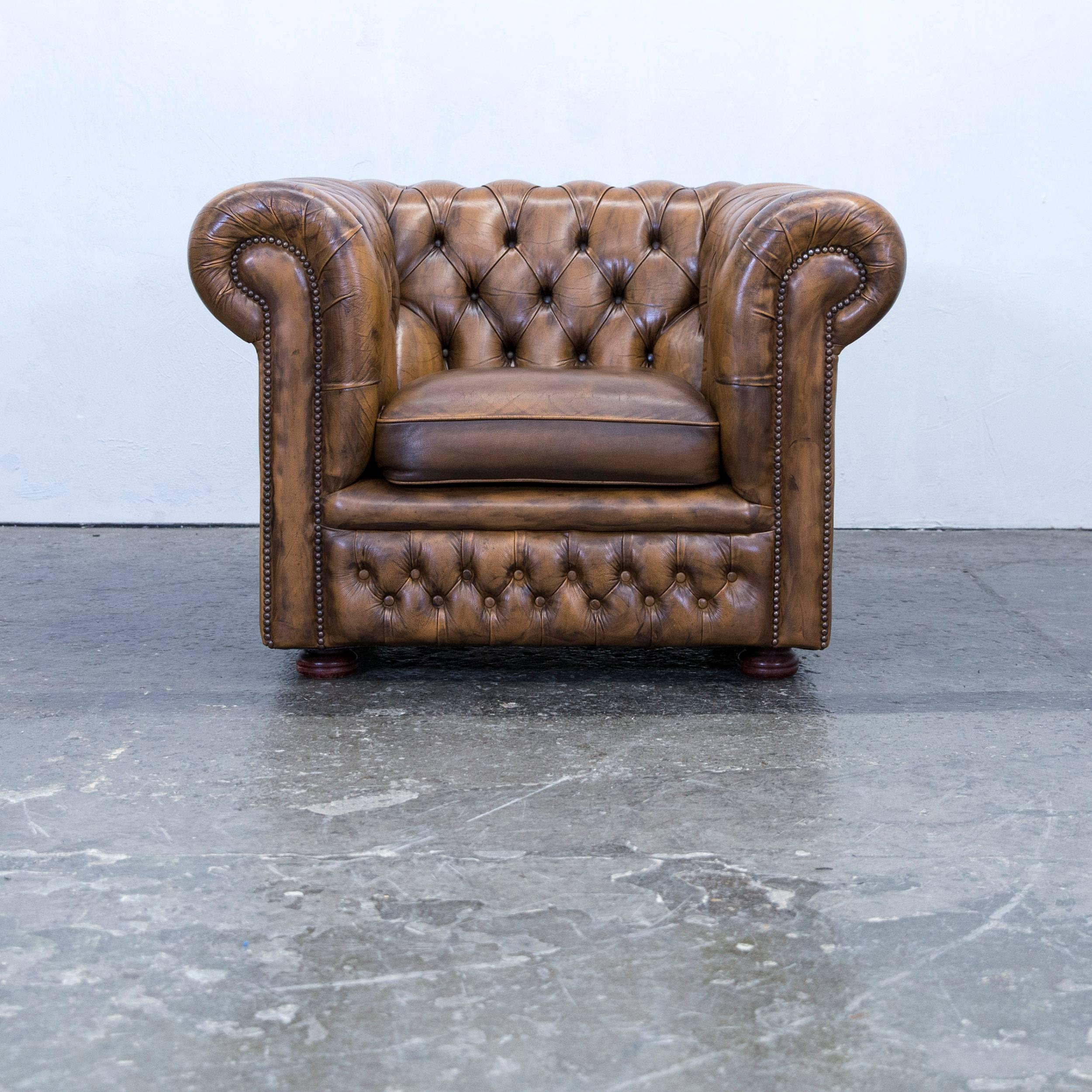 Brown colored Chesterfield leather clubchair in an elegant design, made for pure comfort.