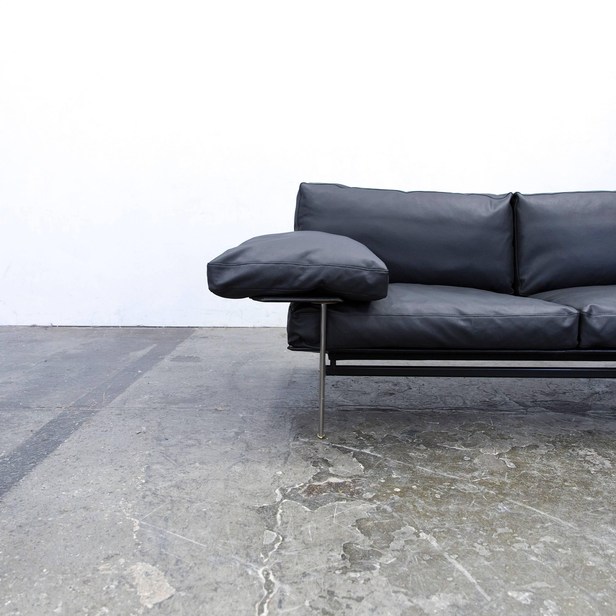 Black colored original B&B Italia Diesis designer leather sofa, in a minimalistic and modern design, made for pure comfort and style.