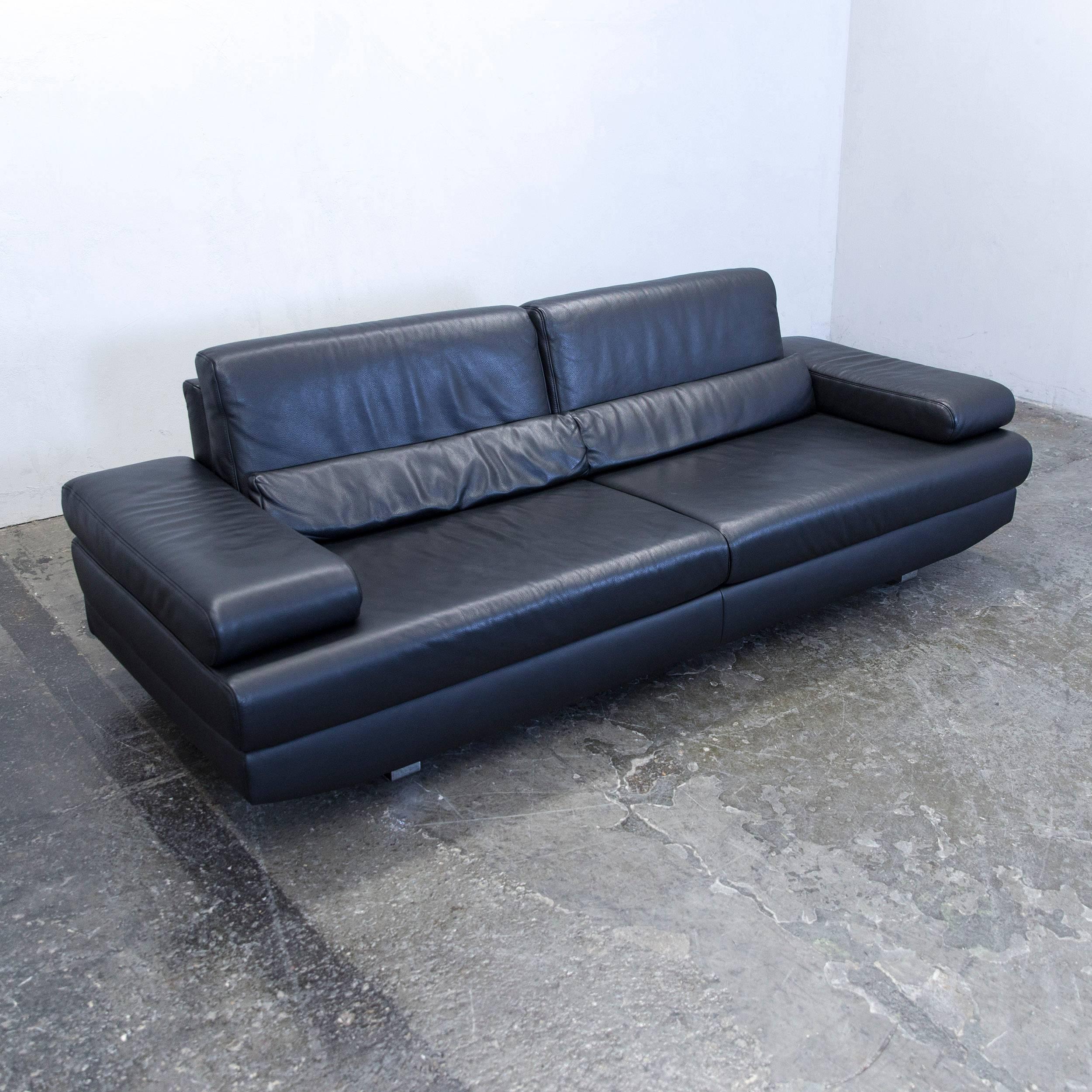 Black colored original Ewald Schillig Harry designer leather sofa, in a minimalistic and modern design, made for pure comfort.