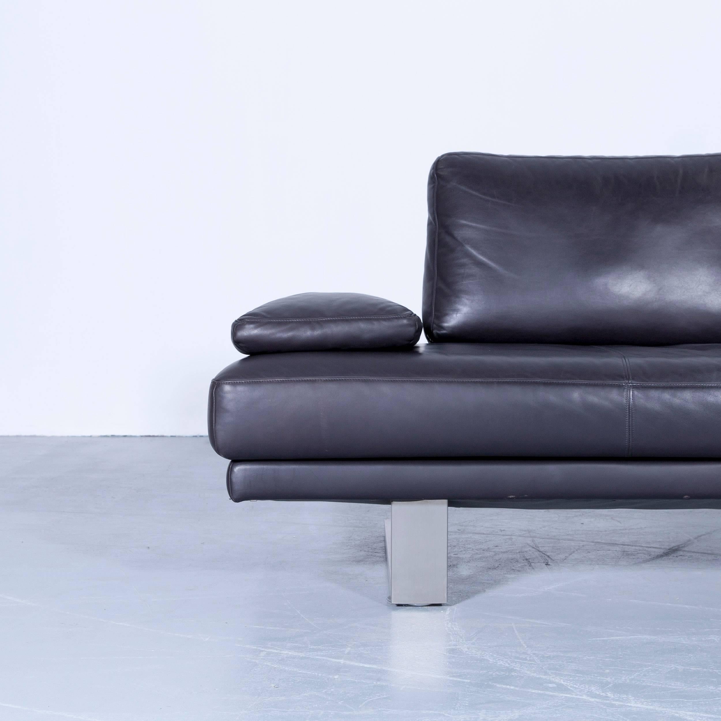 Aubergine black colored original Rolf Benz 6600, in a minimalistic and modern design, made for pure comfort and style.