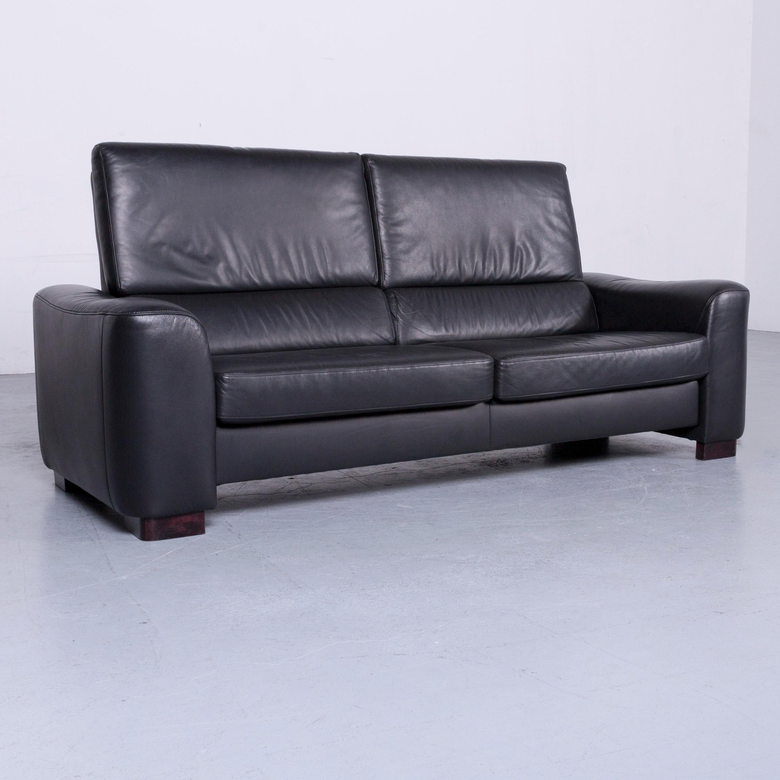 Black colored original Ewald Schillig designer leather sofa in a minimalistic and modern design, made for pure comfort.