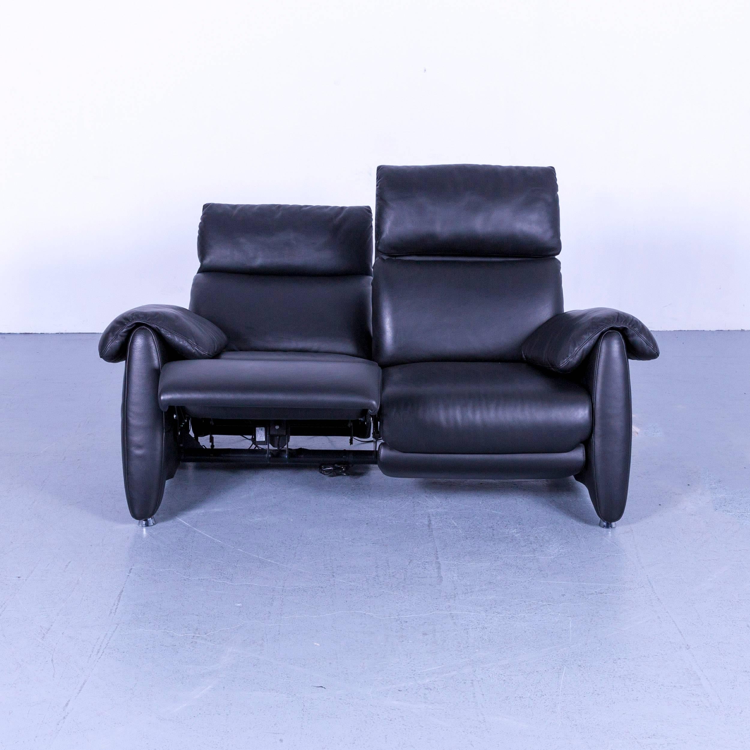 An designer sofa leather black two-seat couch modern electric recliner.
















   