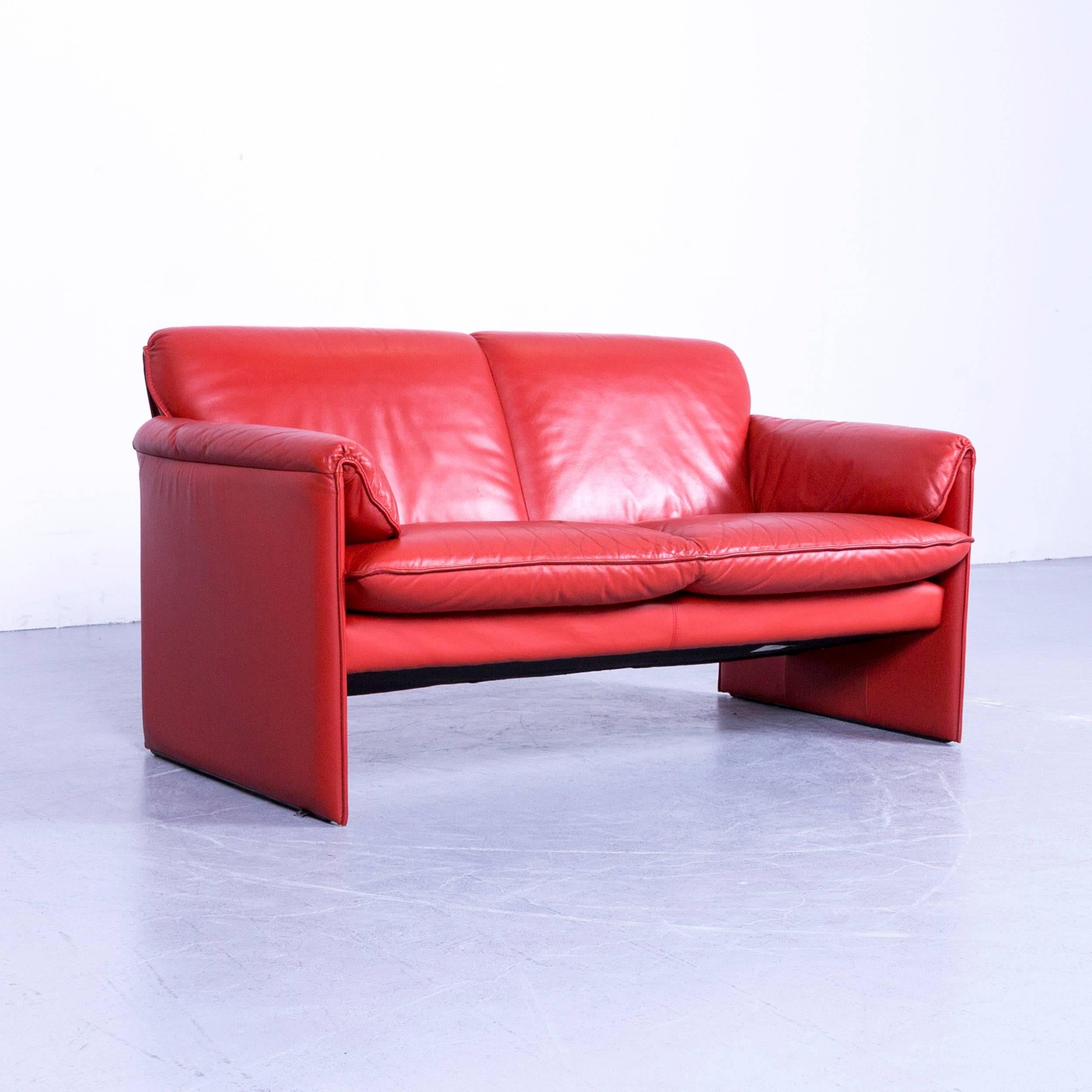 Orange red colored original Leolux Bora designer leather sofa in a minimalistic and modern design, made for pure comfort.