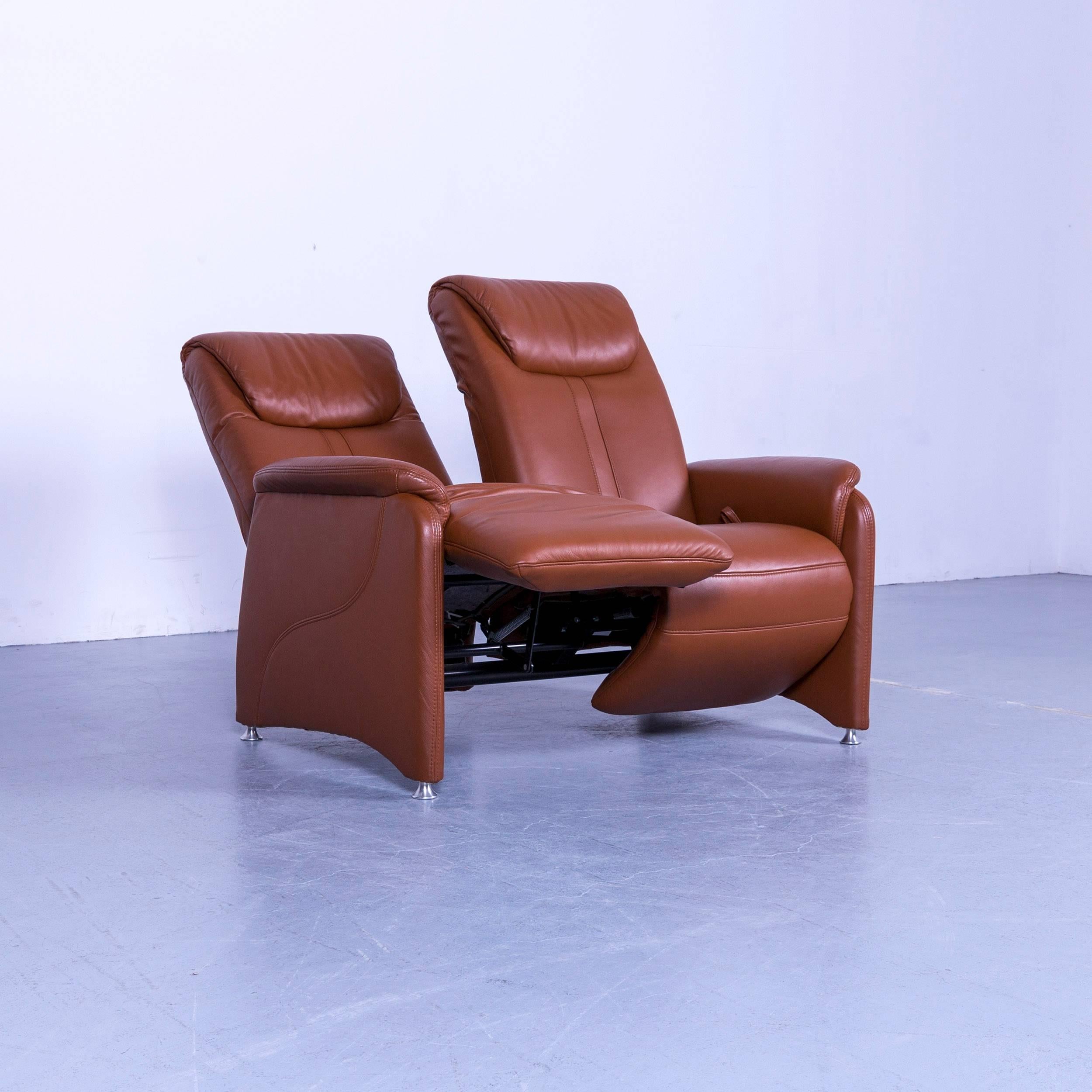 An Willy Schillig designer leather sofa brown two-seat recliner.
















   