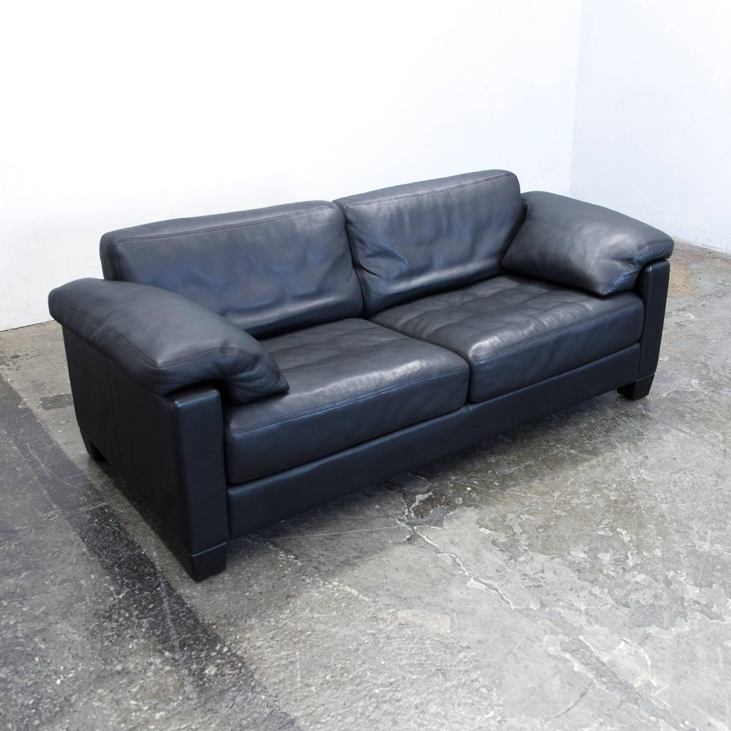 Black colored original De Sede DS 17 designer leather sofa, in a minimalistic and modern design, made for pure comfort.