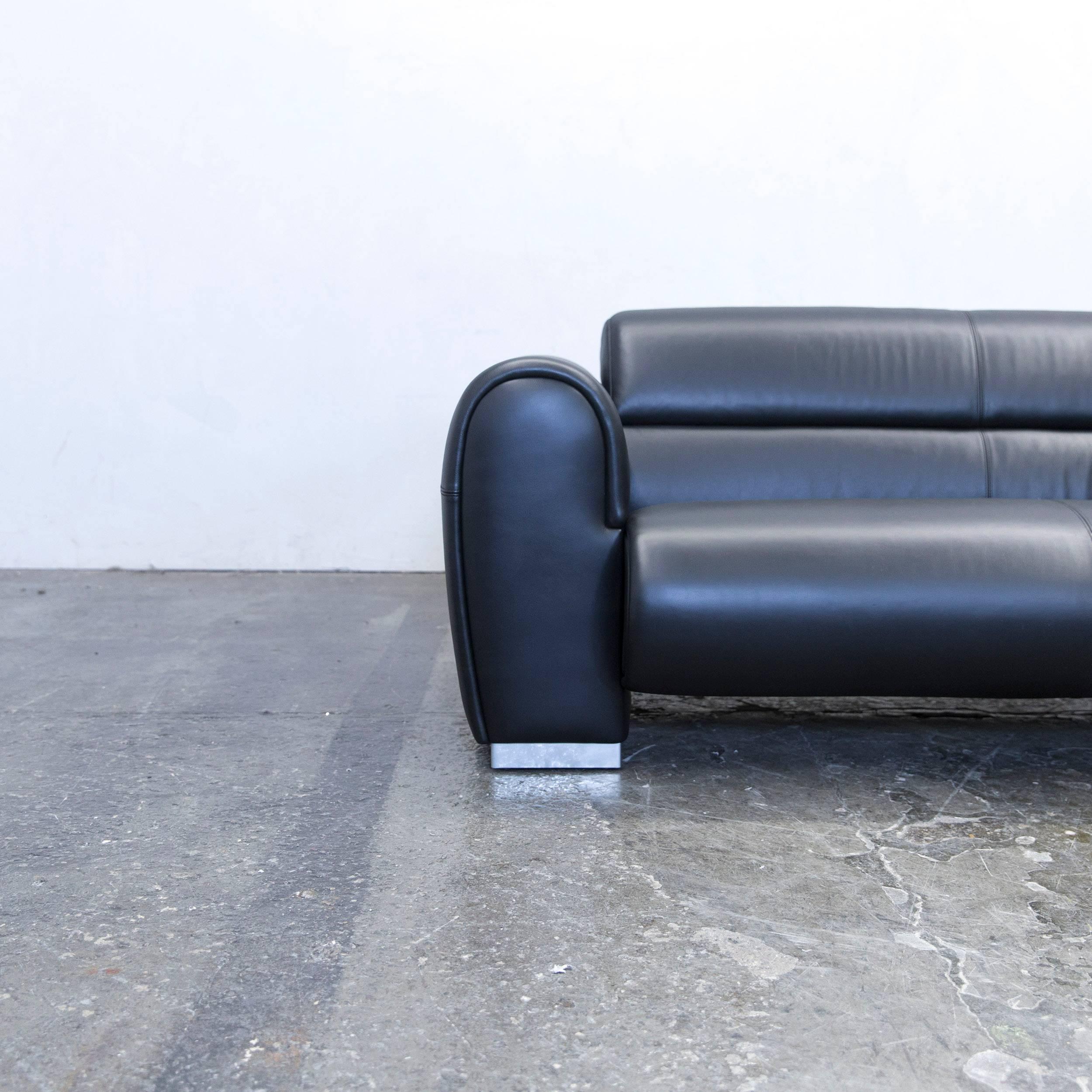 Black colored original Brühl & Sippold designer leather sofa, in a minimalistic and modern design, made for pure comfort.