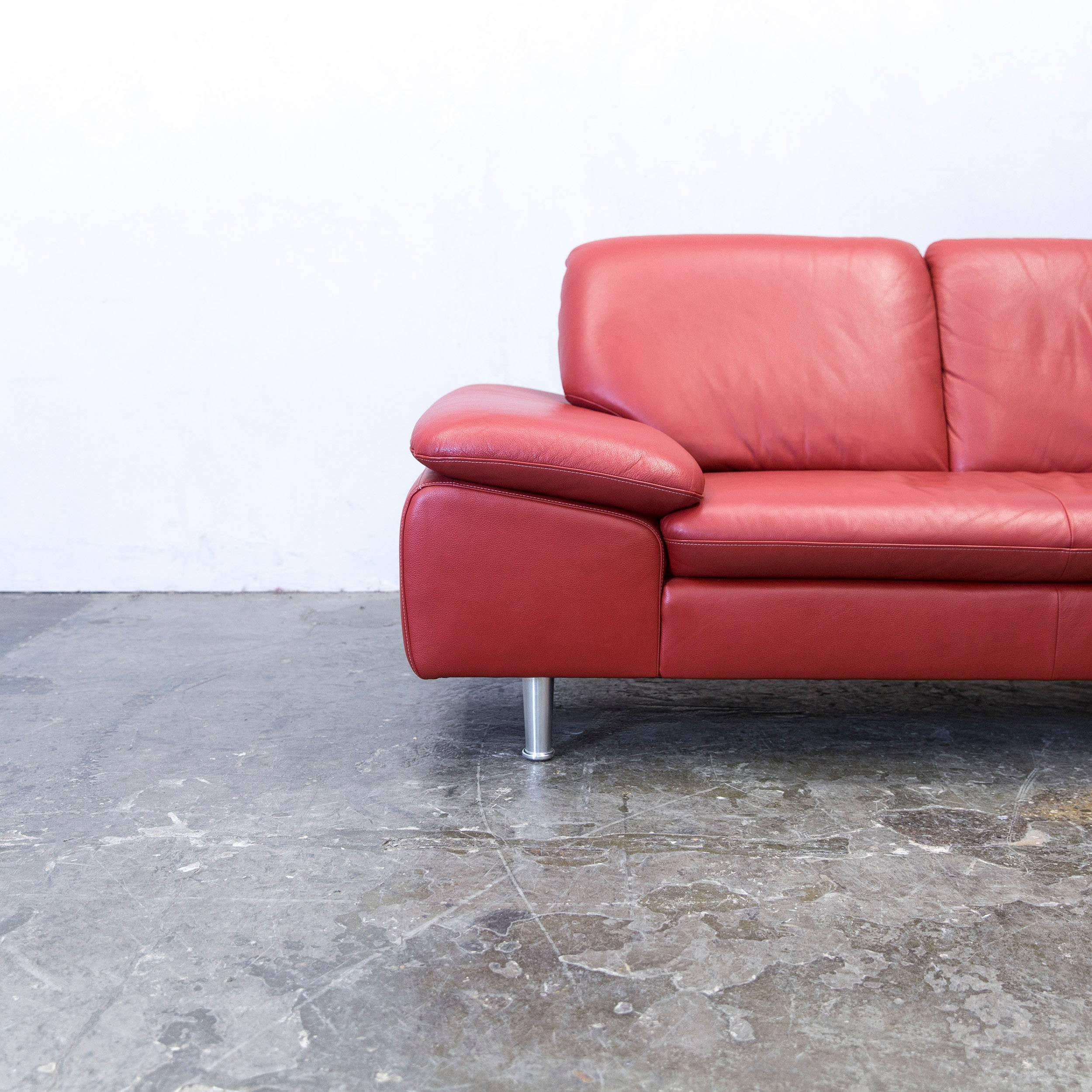 Red colored original Willi Schillig loop designer corner sofa, in a minimalistic and modern design, made for pure comfort.