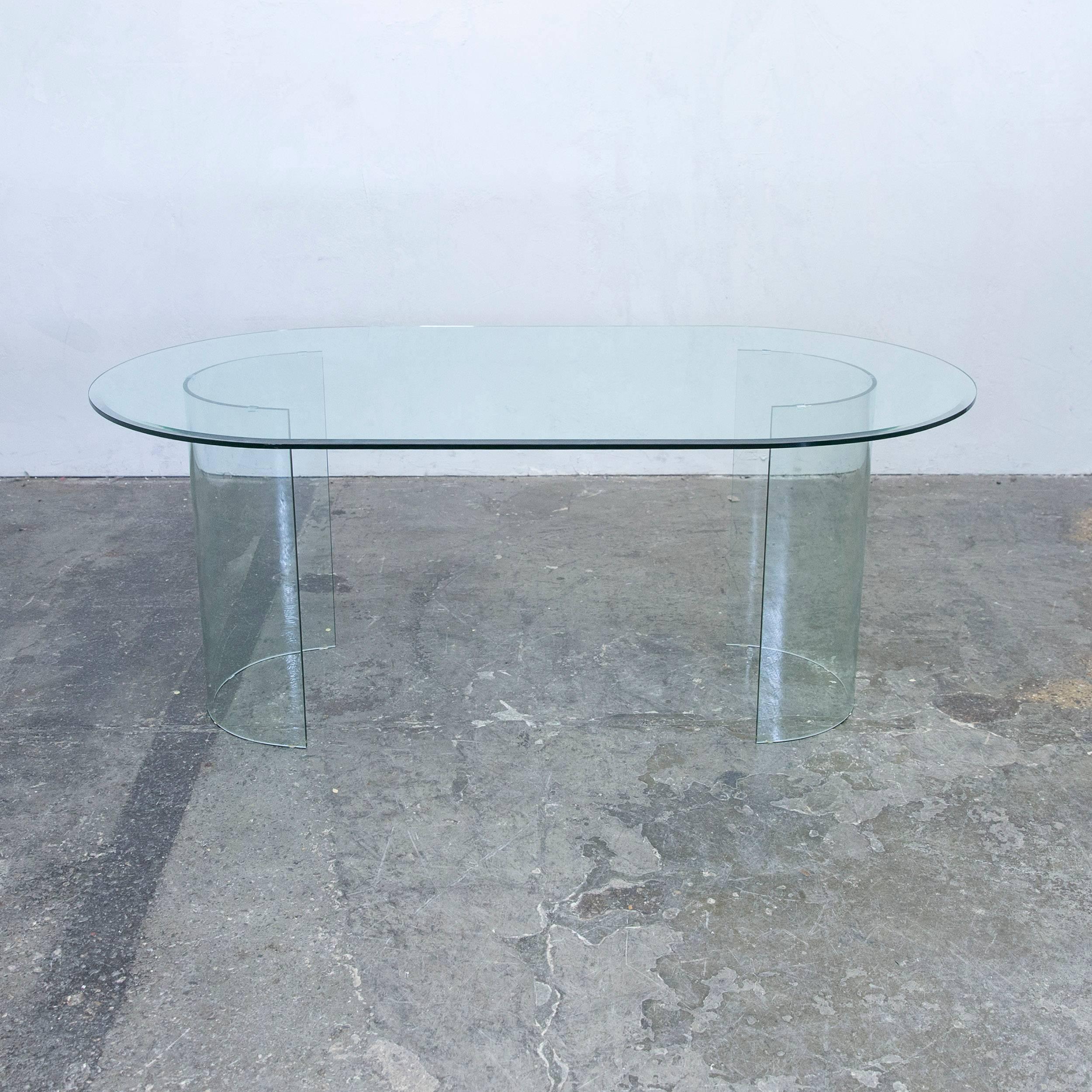 Transparent green colored glass designer sofa table, in a minimalistic and modern design, made for pure style.