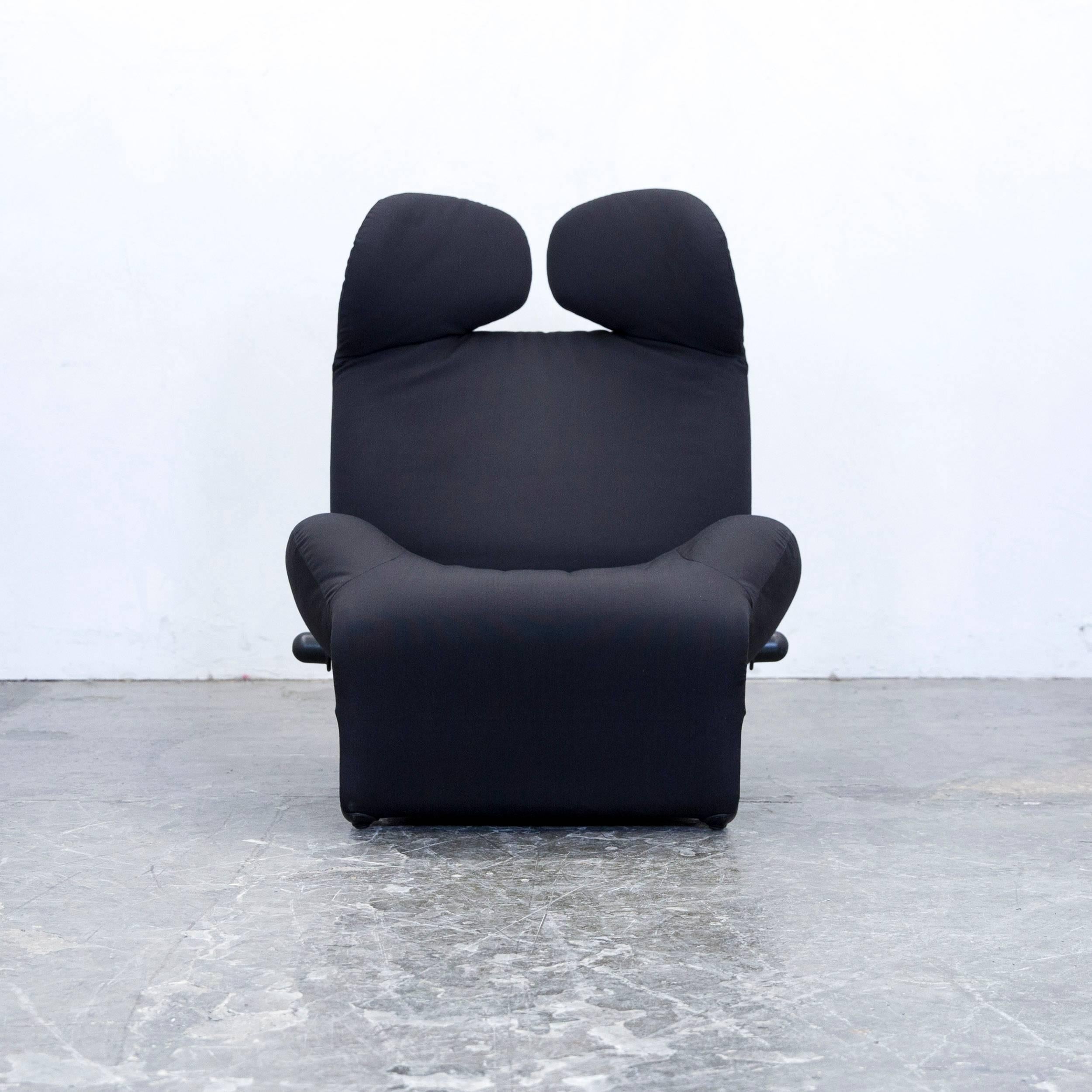 Black colored original Cassina Wink designer armchair, in a minimalistic and modern design, with convenient functions, made for pure comfort.