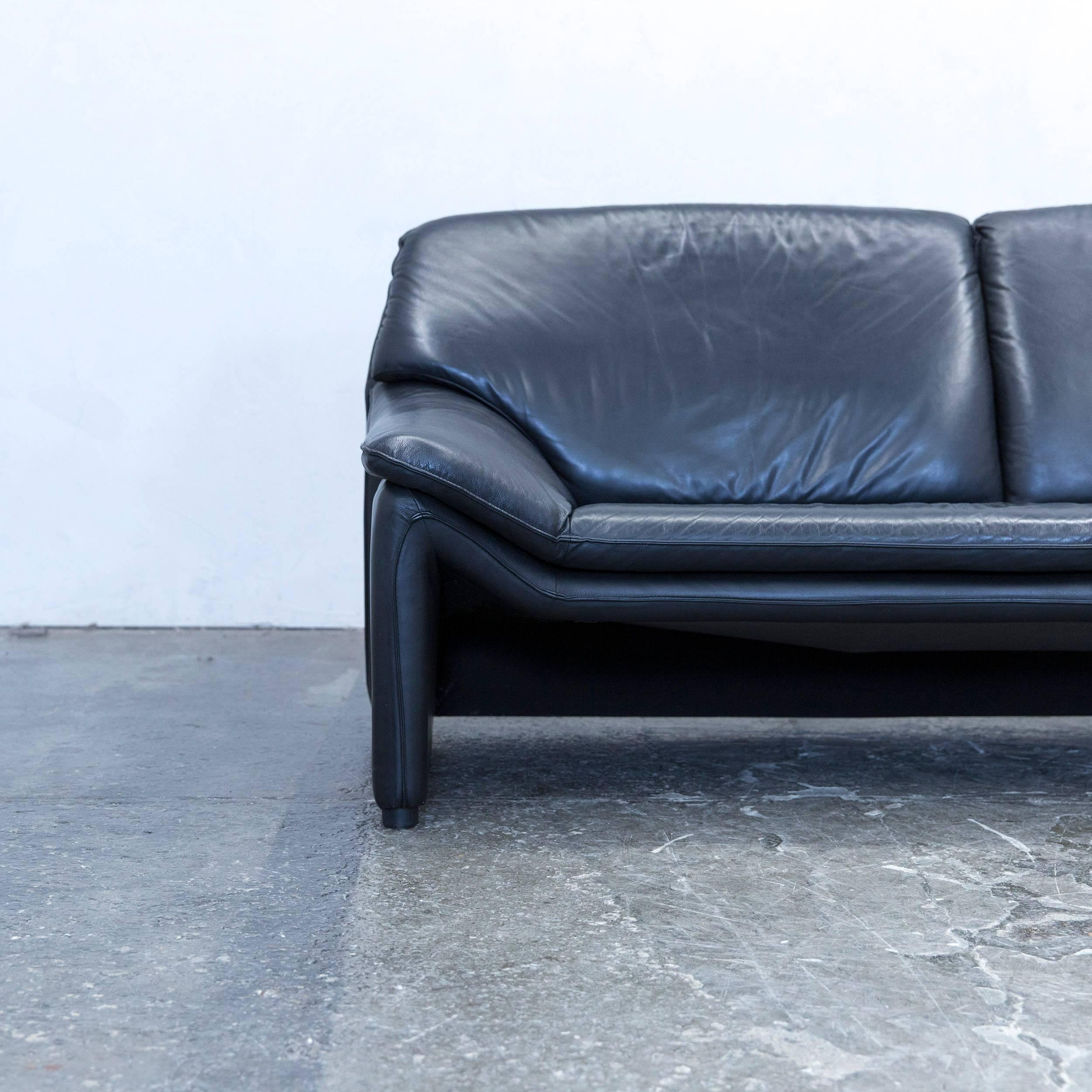 Black colored original Laauser Atlanta designer leather sofa, in a minimalistic and modern design, made for pure comfort.