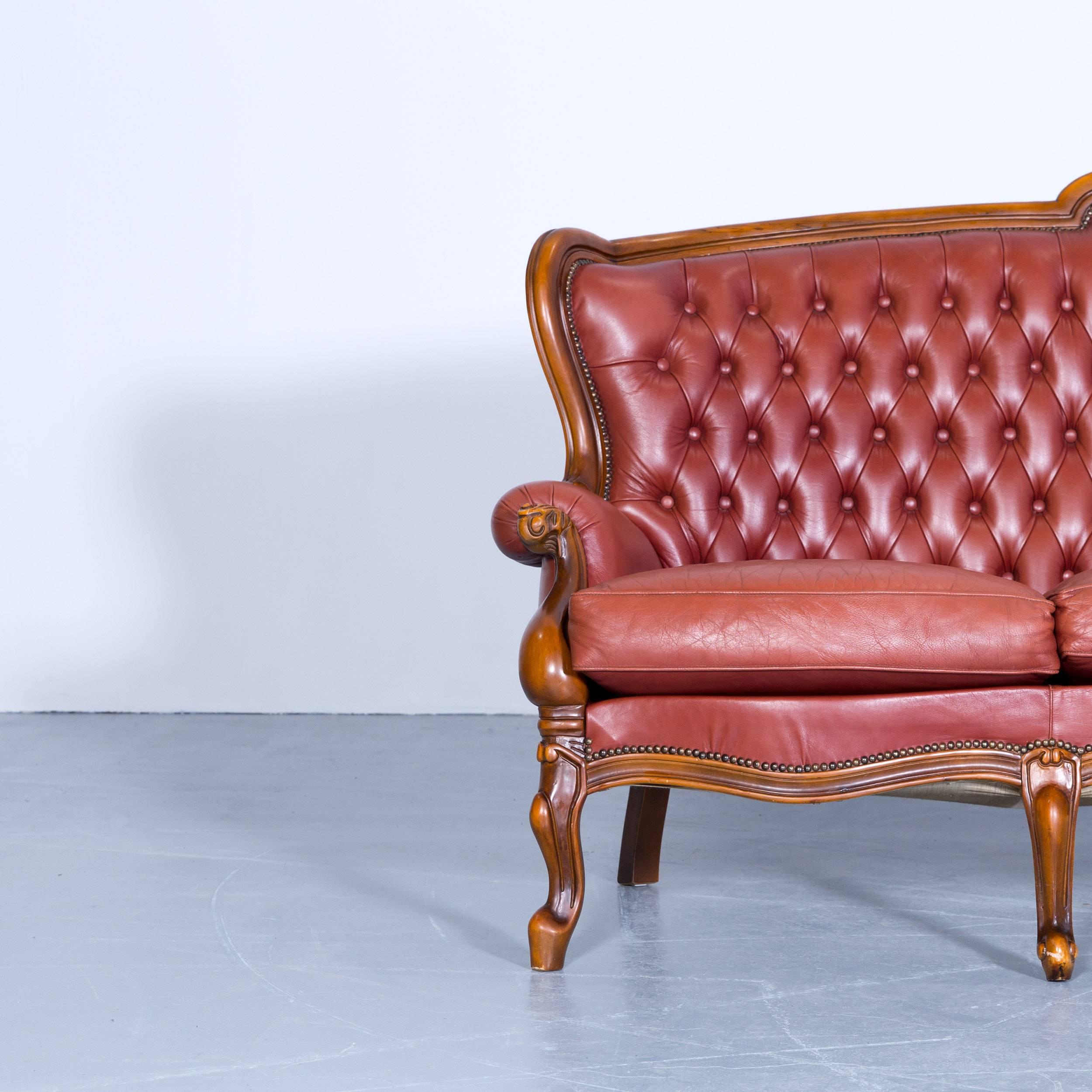 Barock Chesterfield sofa red brown orange leather three-seat couch vintage retro rivets, made for pure comfort.