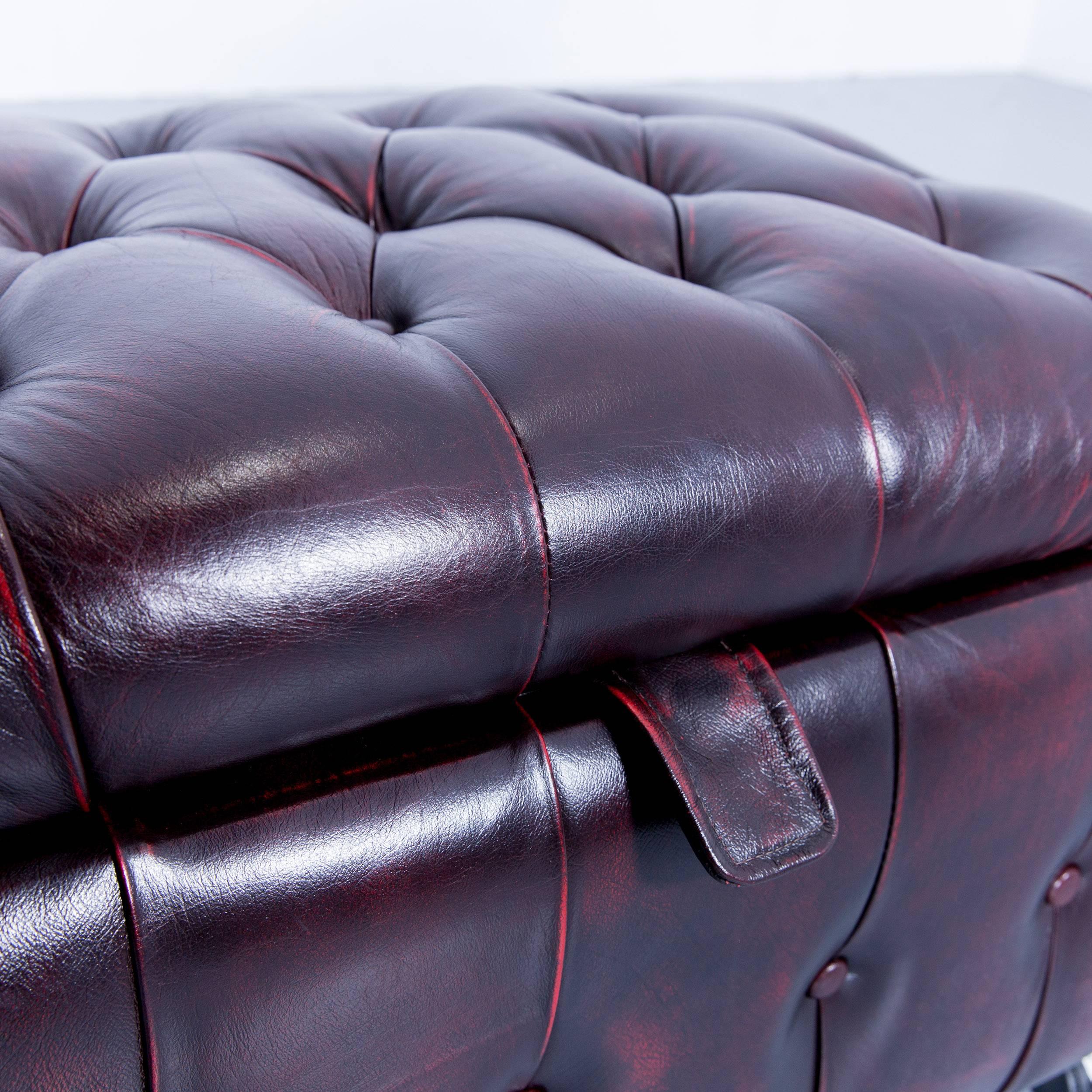 red leather footstool