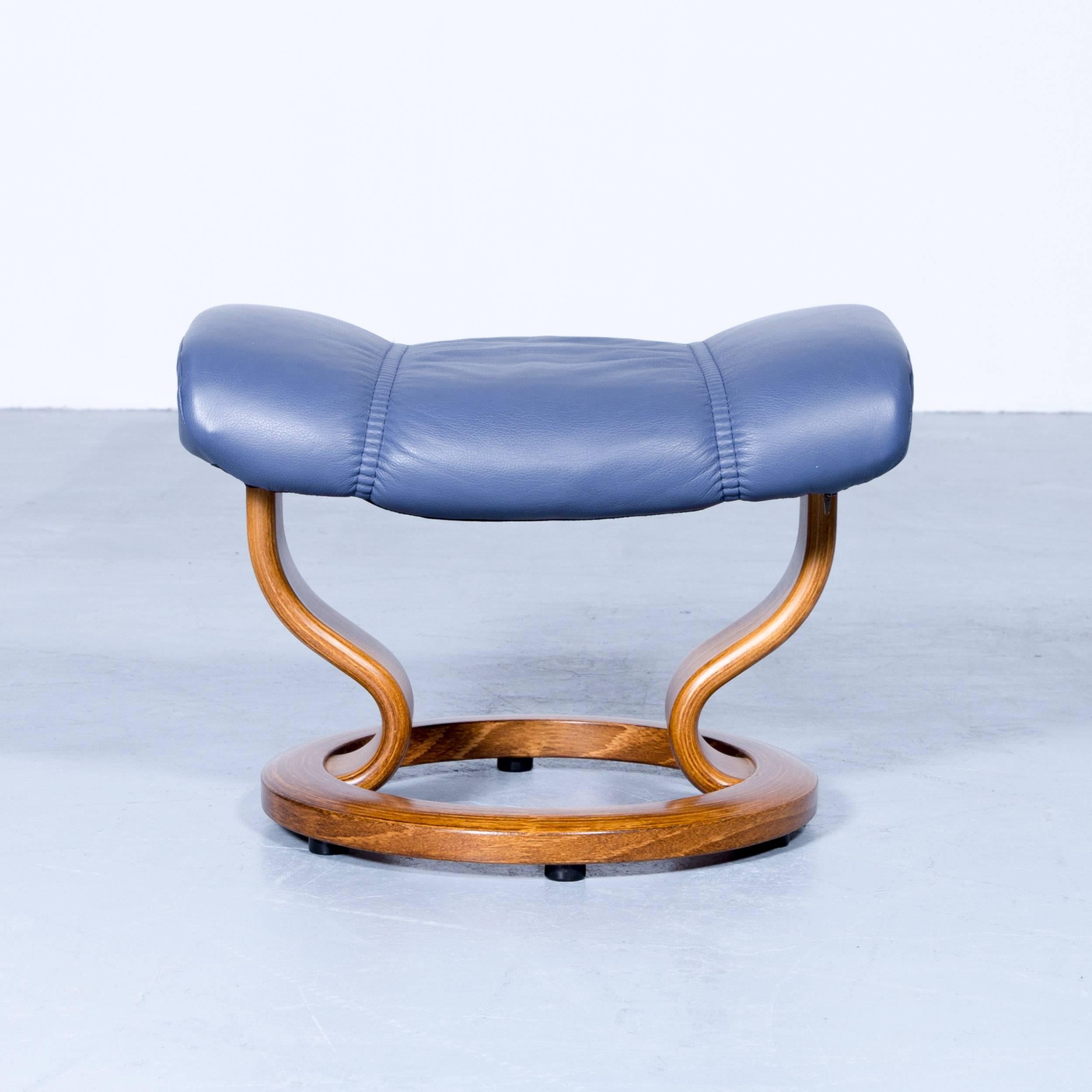 Ekornes Stressless consul footstool leather blue modern footrest in a minimalistic and modern design, with convenient functions, made for pure comfort and flexibility.