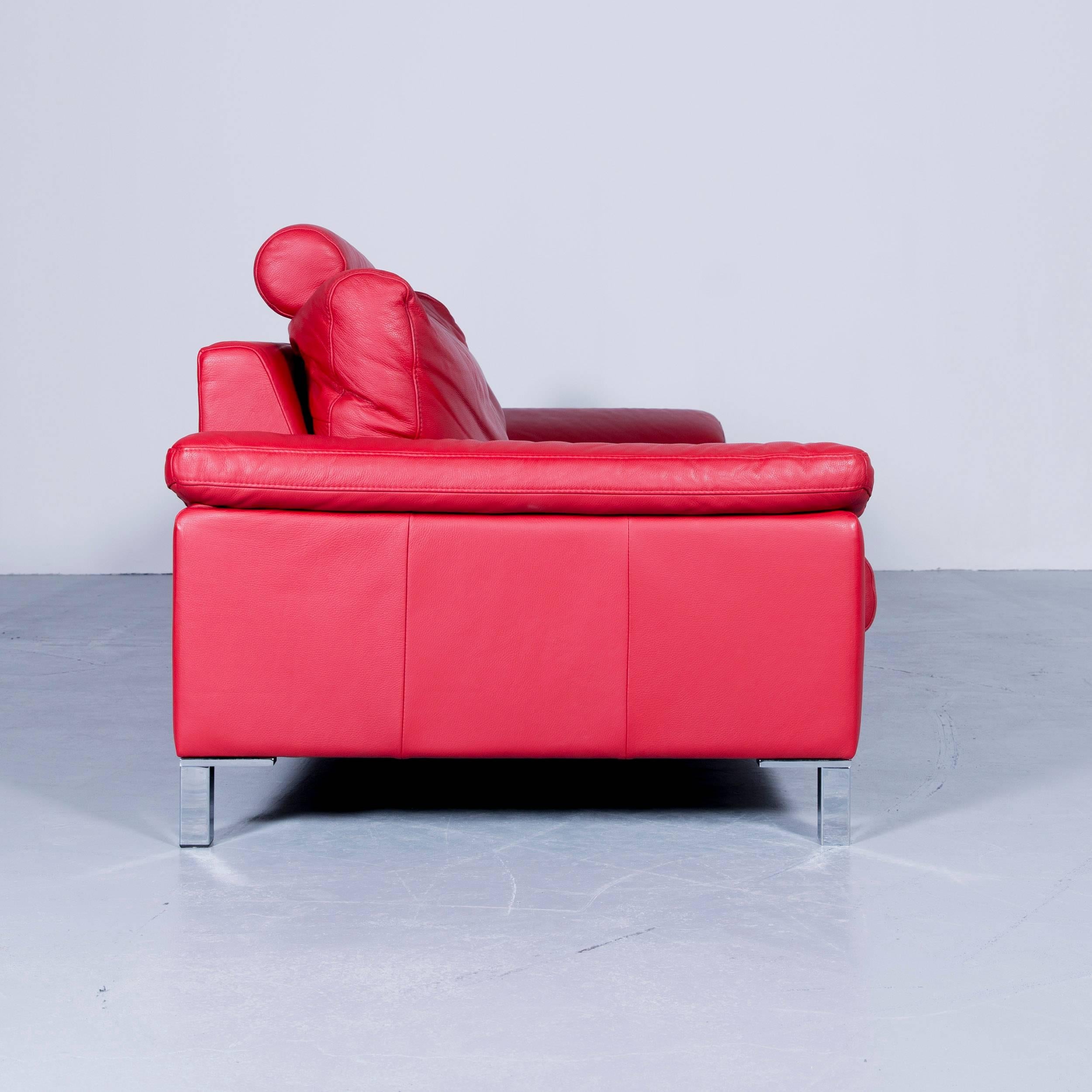 Designer sofa red three-seat leather modern couch head rest.