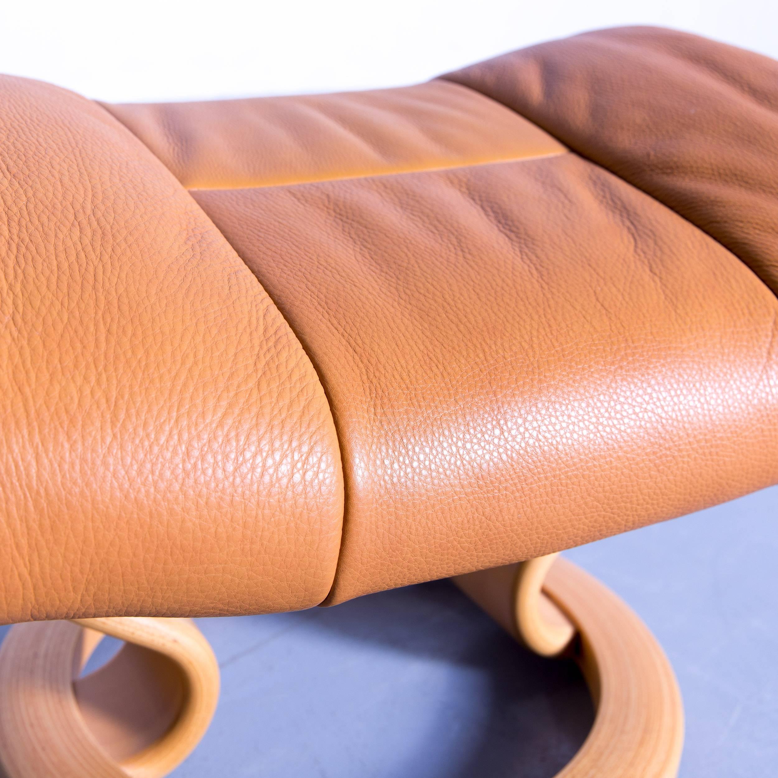 orange leather footstool
