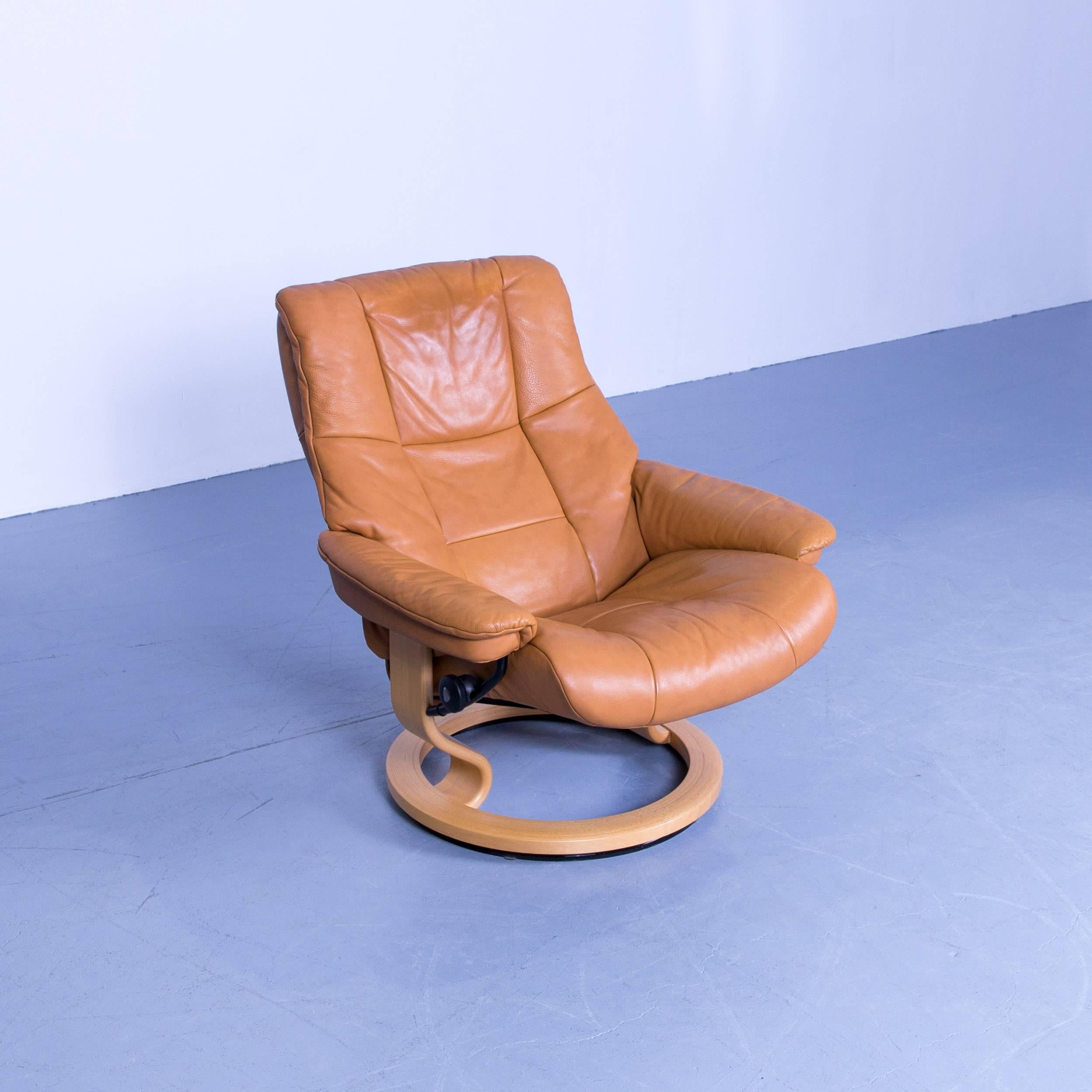 Stressless Mayfair relax armchair footstool orange brown leather relax recliner, with convenient functions, made for pure comfort and flexibility.